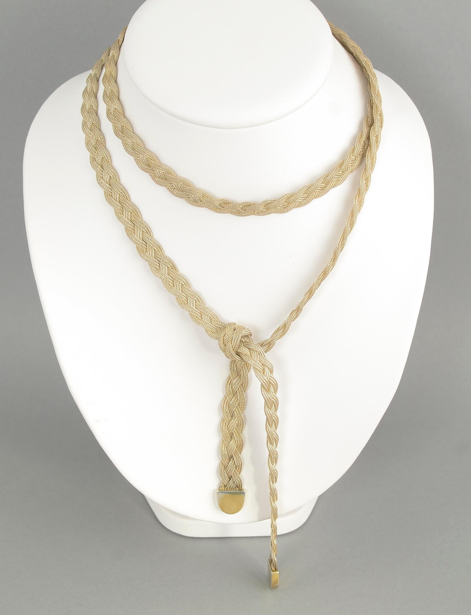This Cartier sterling silver necklace is beautiful; unusual and versatile. It can be worn several different ways as a necklace, some of which are shown in thumbnail photos. It can also be tied as a belt. It measures 41 inches long and 3/8