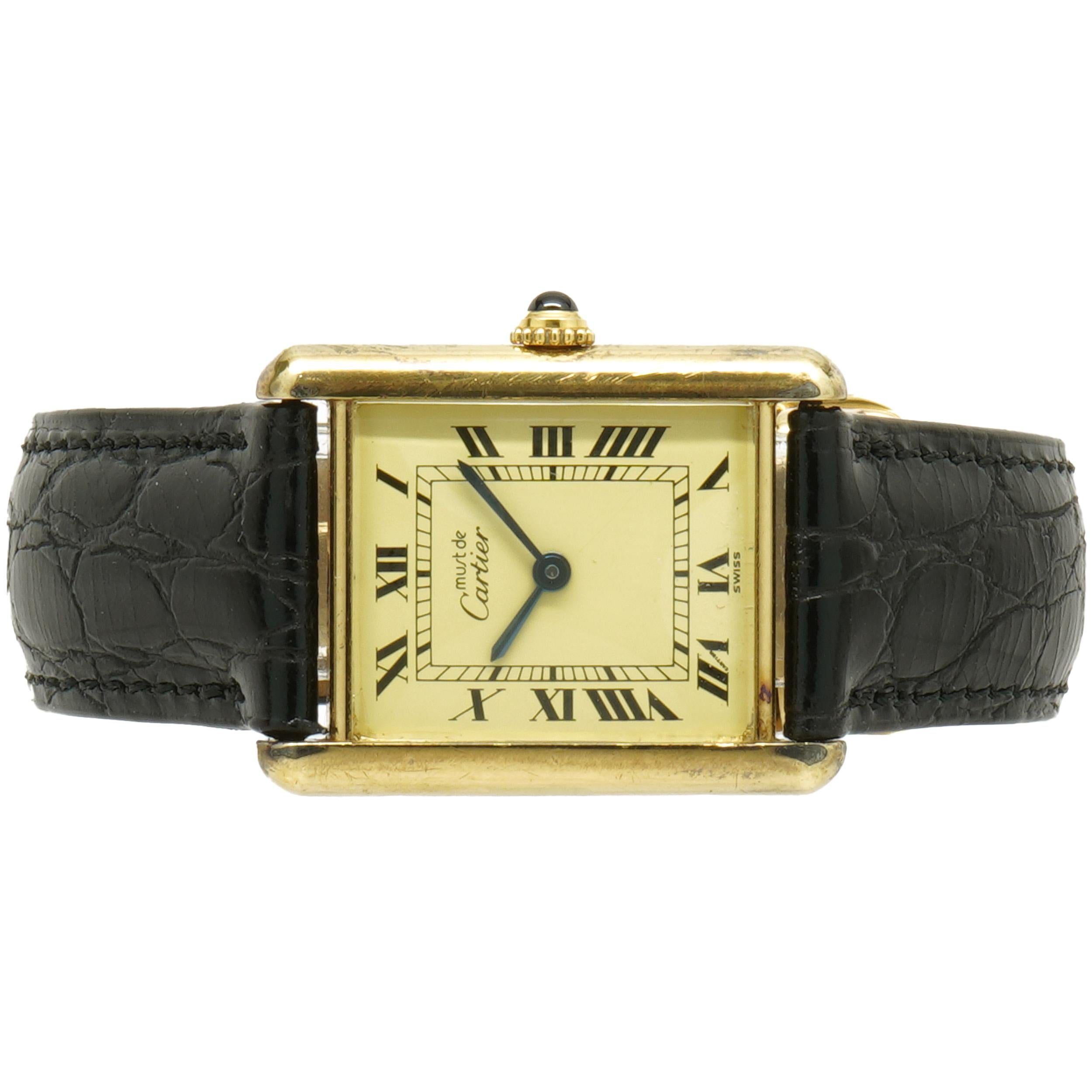 Movement: automatic
Function: hours, minutes
Case: 22mm rectangular case, smooth bezel
Dial: white roman dial, steel sword sweeping hands
Band: Cartier black leather strap, integrated clasp
Serial #: 141XXX
Reference # 590005
 
Complete with