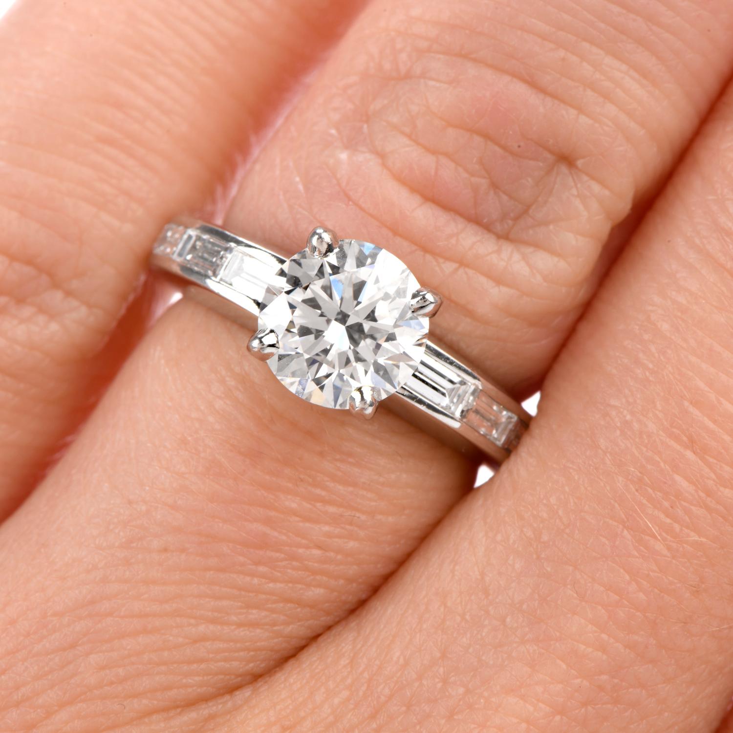 This extraordinary Su Solitario Cartier Engagement ring was inspied in a 

classicaly elegant Solitaire design and crafted in Platinum.

Adorning the center is a GIA Certified 1.73 carat round brilliant diamond

and is of F color and Internally
