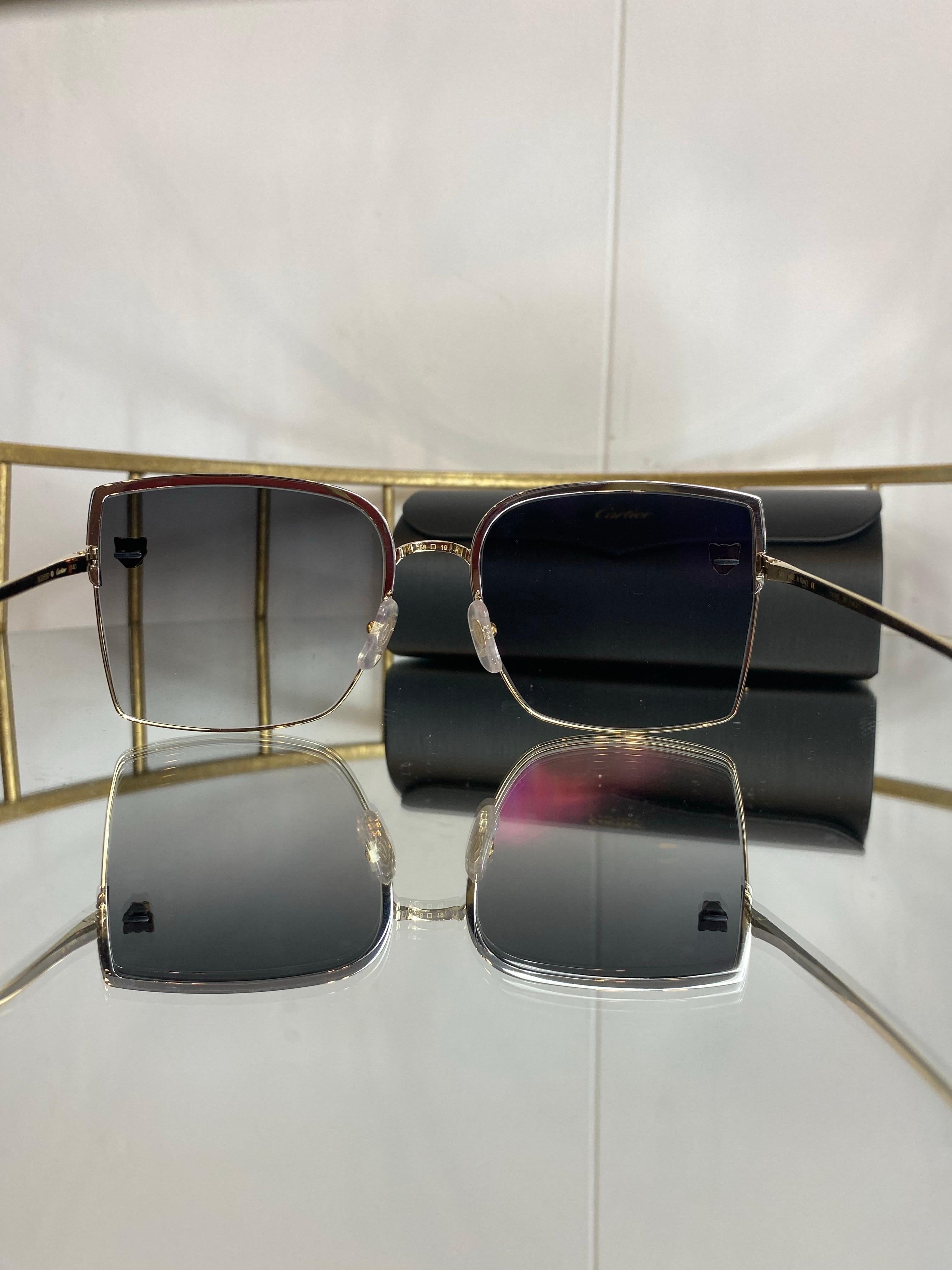 Noir Lunettes de soleil Cartier en vente