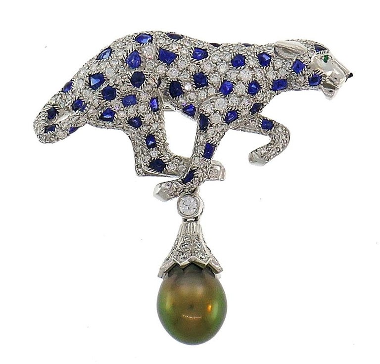 Cartier Tahitian Grey Pearl, Sapphire and Diamond Panthere Pendant/Clip  Brooch For Sale at 1stDibs | broche cartier panthère, cartier panthere  necklace, cartier tiger brooch