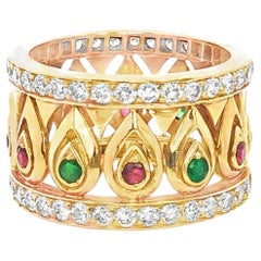 Cartier Tanjore Band Ring in 18K Gold with Diamonds, Rubies, and Emeralds 1980's