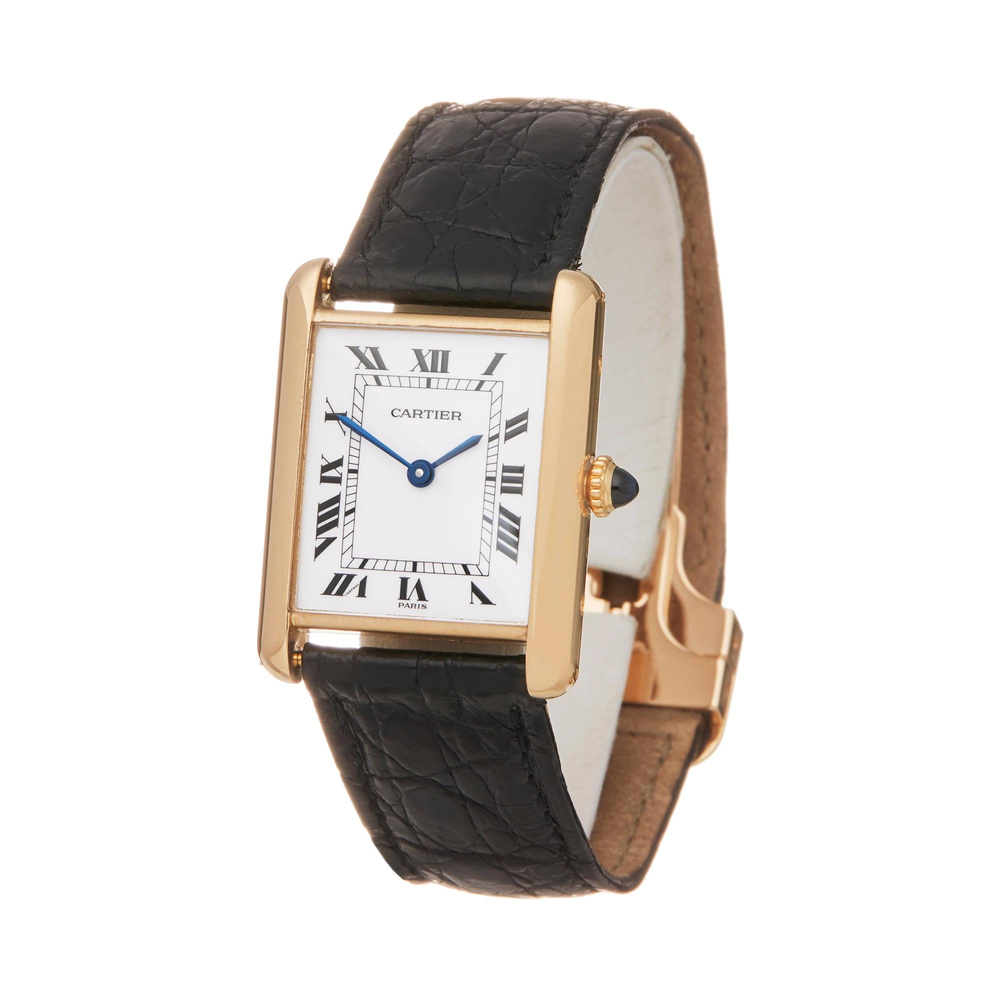 Ref: W5885
Manufacturer: Cartier
Model: Tank
Model Ref: 81720552
Age: 14th January 1980
Gender: Unisex
Complete With: Box, Guarantee, Service Pouch and Papers dated 6th March 2019 
Dial: White Roman 
Glass: Sapphire Crystal
Movement: Mechanical