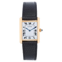 Montre pour femmes Cartier Tank en or jaune 18k