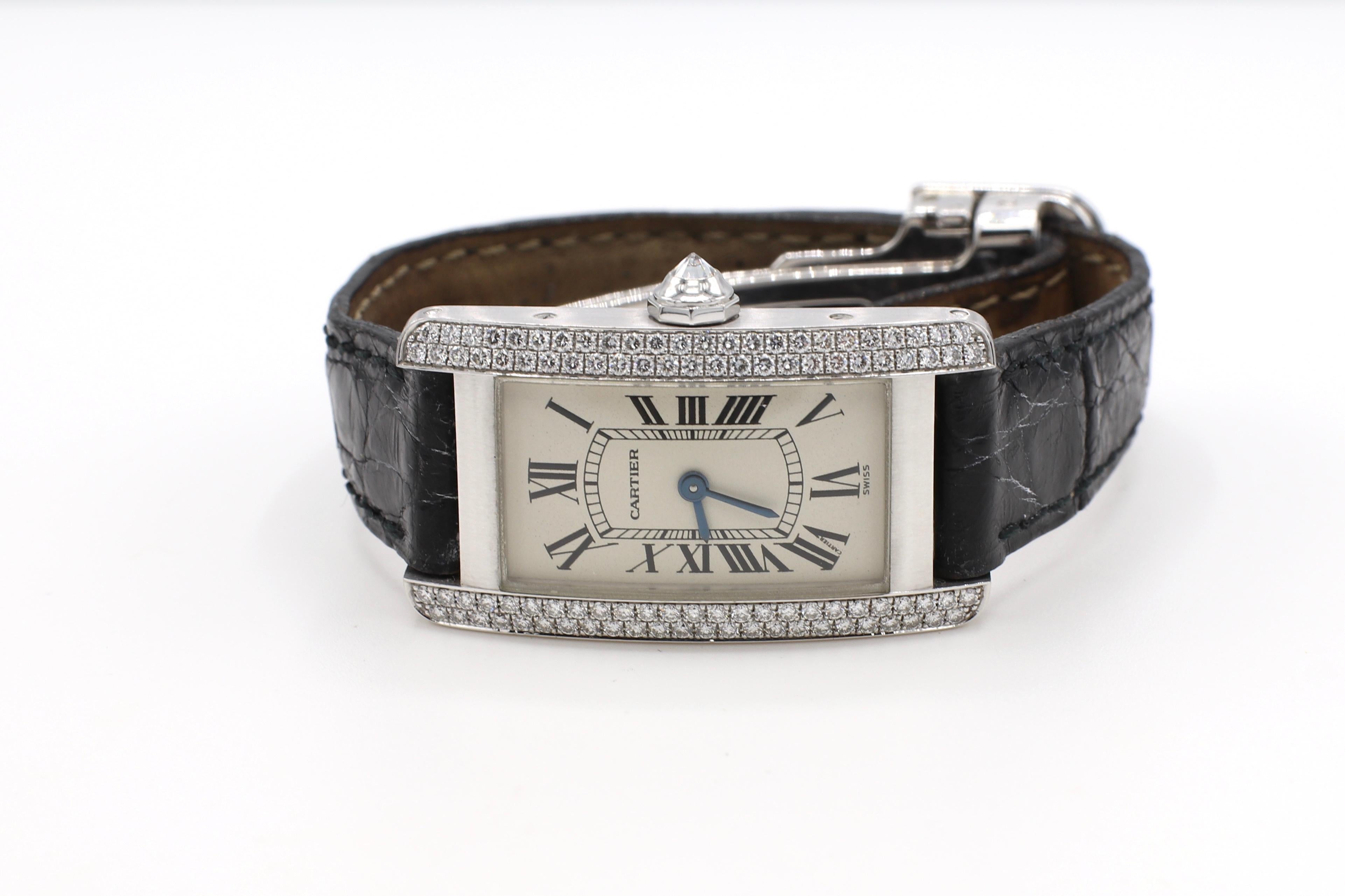 Cartier Tank Americaine 1713 18K White Gold Diamond Leather Strap Watch 

Reference: 1713
Metal: 18k white gold
Crystal: Sapphire
Movement: Quartz
Strap: Black leather strap, signs of wear, please note pictures for condition 
Clasp: Folding 
Dial: