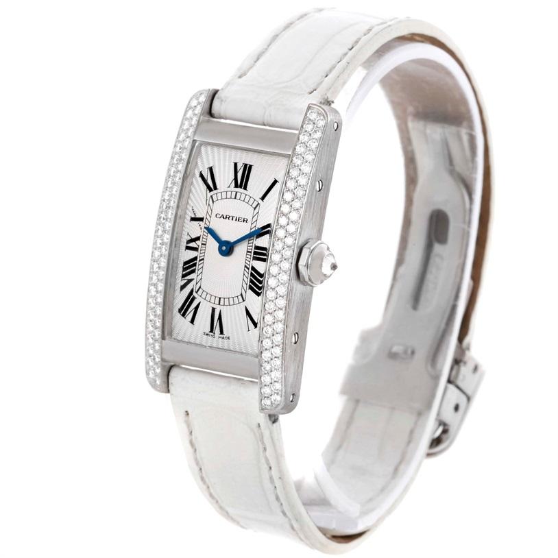Cartier Tank Americaine 18K White Gold Diamond Watch WB701851. Quartz movement. 18K white gold case 19.0 x 35.0 mm with 2 rows of diamond on the sides. Circular grained crown set with faceted diamond. Silvered guilloche dial with black roman