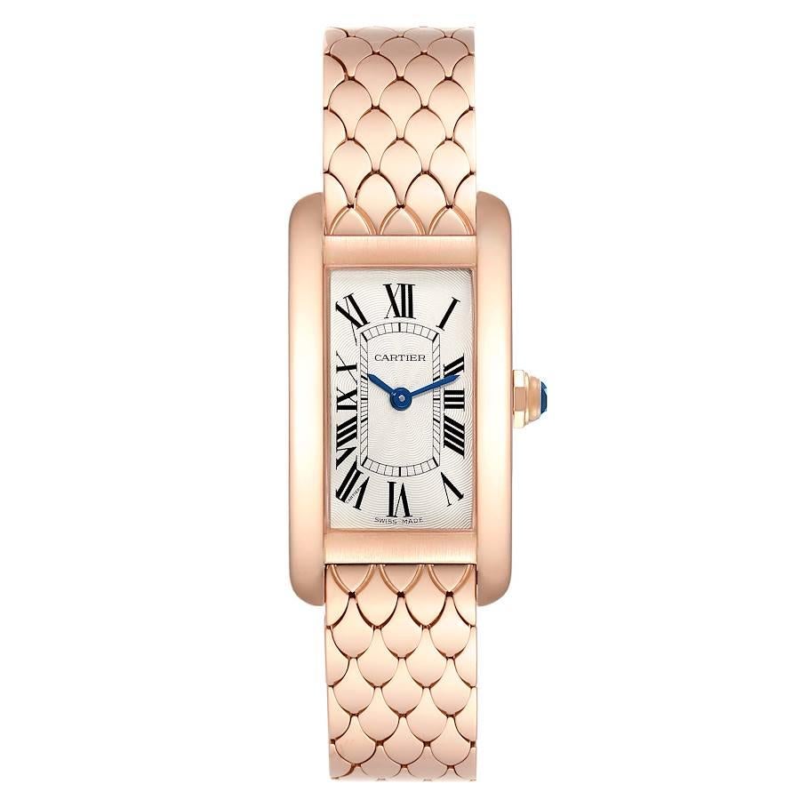 Cartier Tank Americaine 18K Rose Gold Ladies Watch W2620031 Box Papers. Quartz movement. 18K rose gold case 19.00 x 34.8 mm. Circular grained crown set with faceted blue sapphire. . Scratch resistant sapphire crystal. Silvered grained dial with