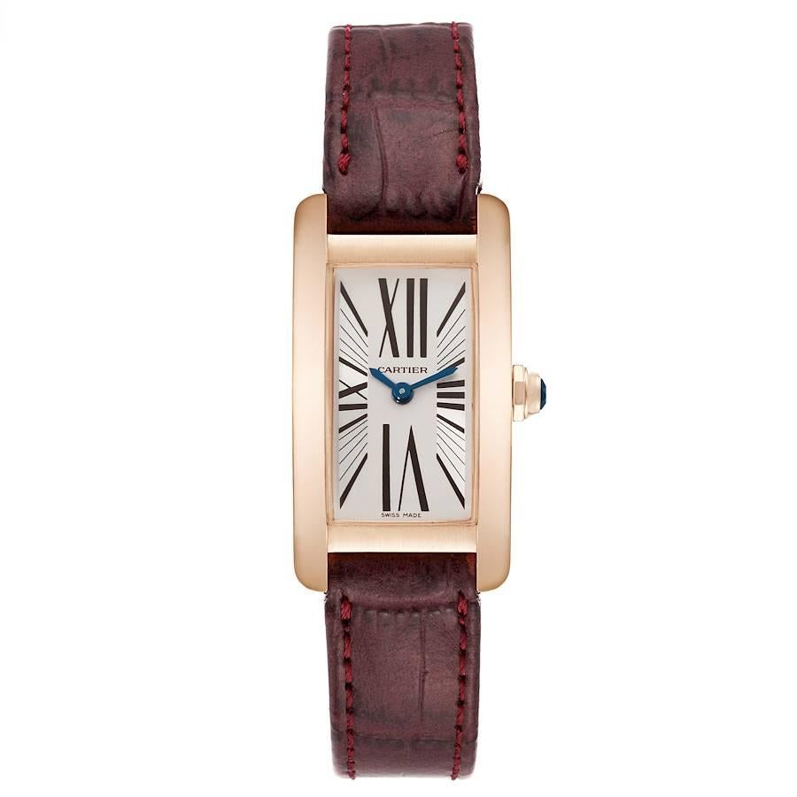 Cartier Tank Americaine 18K Rose Gold Silver Dial Ladies Watch W2607056. Quartz movement. 18K rose gold case 19.0 x 35.0 mm. Circular grained crown set with blue faceted sapphire. . Scratch resistant sapphire crystal. Silvered grained dial with