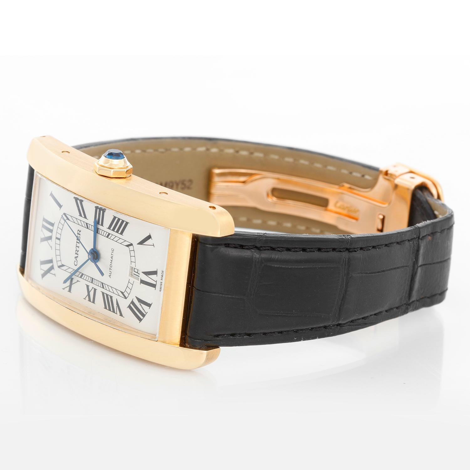 Cartier Tank Americaine 18k Yellow Gold Automatic XL Mens - Automatic winding. 18k yellow gold case (32 mm x 52mm). Silvered flinqué dial. Cartier Alligator strap with 18k rose gold Cartier buckle. Pre-owned with Cartier box and books. The watch is