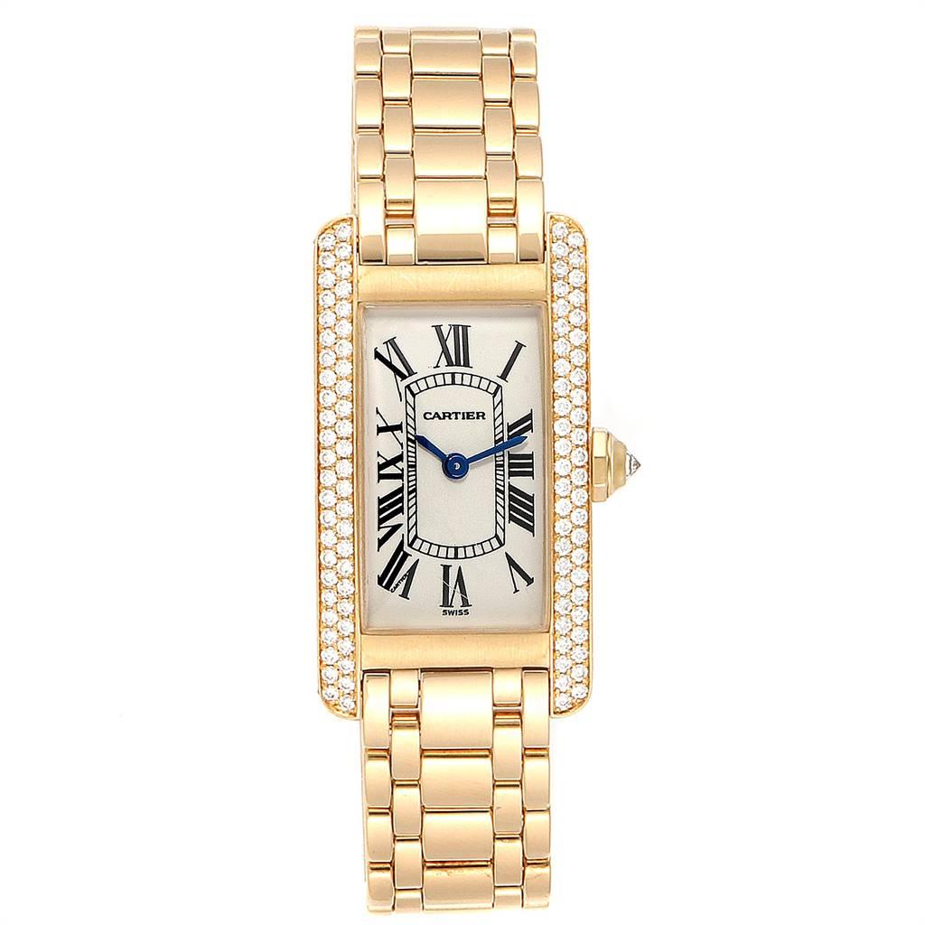 Cartier Tank Americaine 18K Yellow Gold Diamond Ladies Watch WB7012K2. Quartz movement. 18K yellow gold case 19.0 x 35.0 mm. Circular grained crown set with faceted diamond. Scratch resistant sapphire crystal. Silvered grained dial with black roman