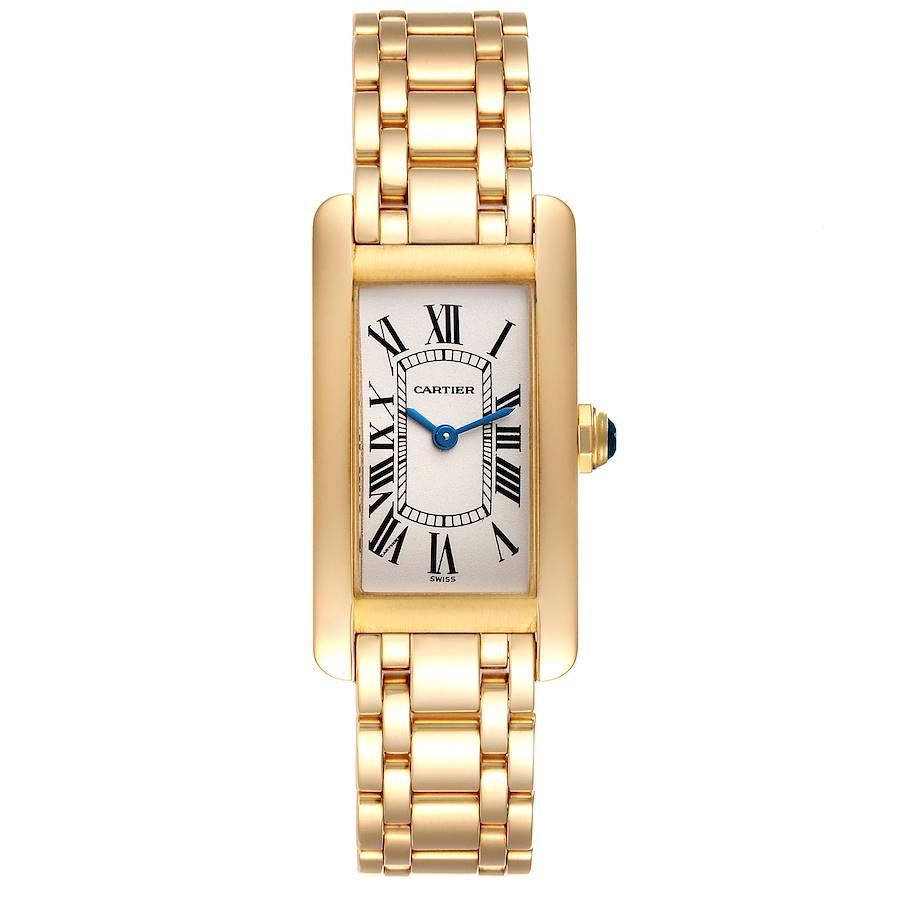 Cartier Tank Americaine 18K Yellow Gold Ladies Watch W26015K2. Quartz movement. 18K yellow gold case 19.0 x 35.0 mm. Circular grained crown set with faceted blue spinel cabochon. . Scratch resistant sapphire crystal. Silvered grained dial with black