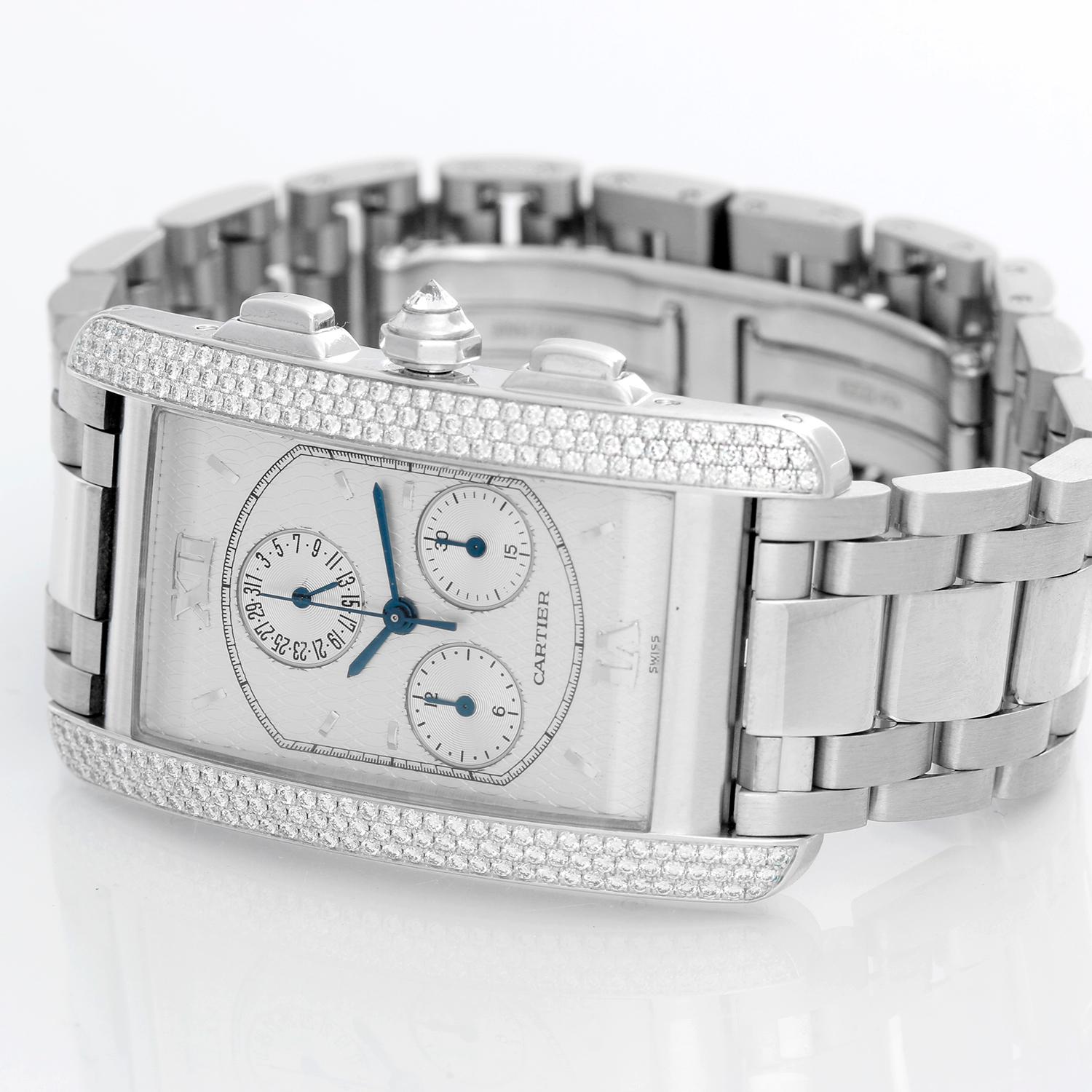 Cartier Tank Americaine Chronograph Men's/Ladies 18k White Gold Diamond Watch - Quartz chronograph with date. 18k white gold rectangular style case (26mm x 45mm). Cartier motif dial with with raised silver stick hour markers ; date; hour minutes and