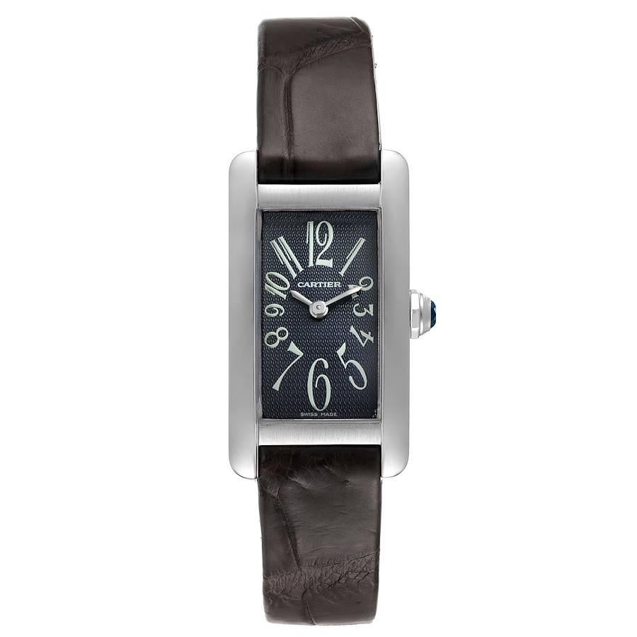 Cartier Tank Americaine Grey Dial 18K White Gold Ladies Watch 1713. Quartz movement. 18K white gold case 19.0 x 35.0 mm. Circular grained crown set with faceted blue sapphire. . Scratch resistant sapphire crystal. Grey textured dial with Arabic