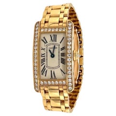 Cartier Tank Americaine en or jaune 18 carats et diamants REF WB7012K2