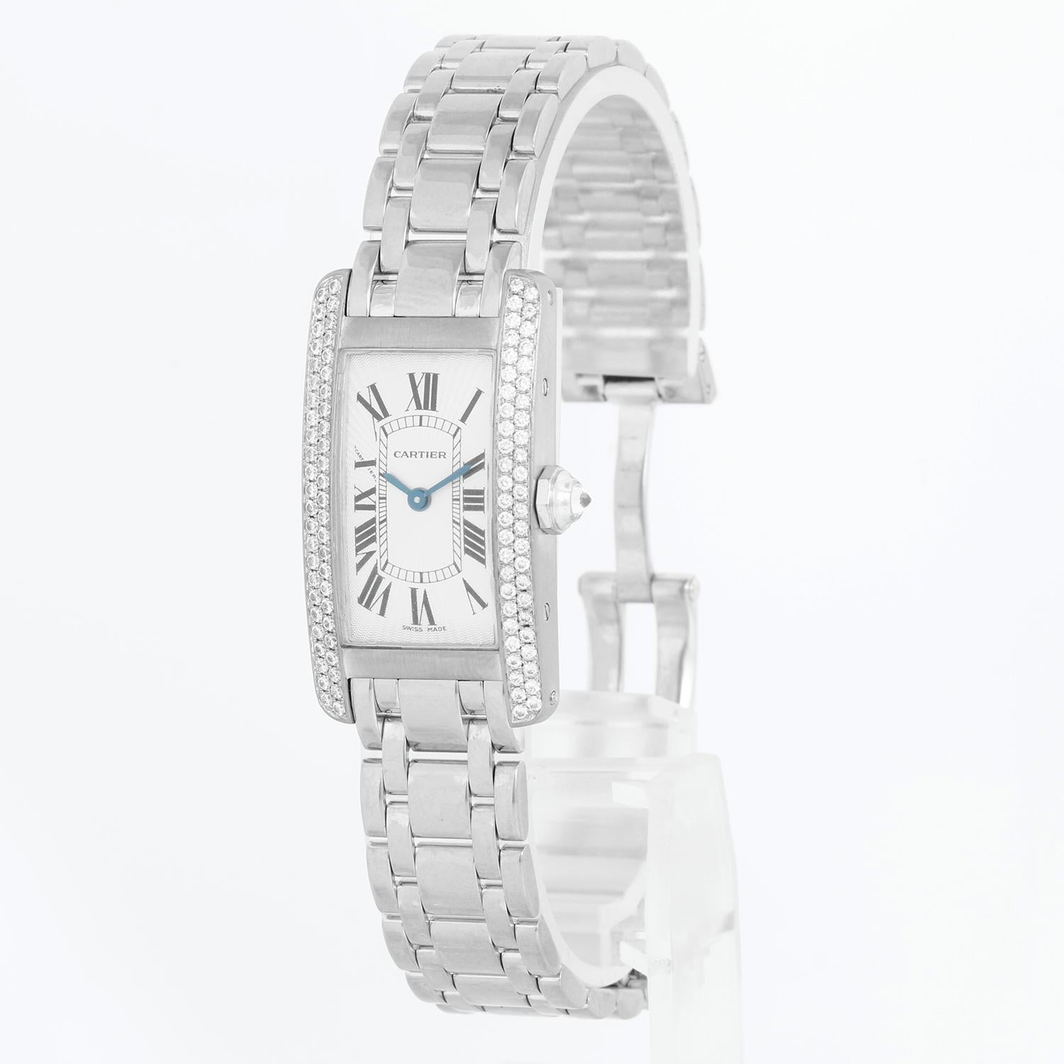 Cartier Tank Americaine Ladies White Gold W26019L1 1713 - Quartz movement. 18k white gold case with 2-row factory diamond bezel  (19 mm x 35 mm ). Guilloche silver colored with black Roman numerals. 18k white gold Cartier bracelet with deployant