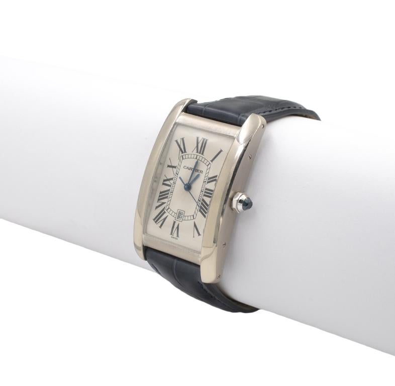 Cartier Tank Americaine Large 18k White Gold Watch, reference W2603256. 26.6 x 45.1 mm, Automatic movement. On a navy Cartier leather strap with a 18k white gold Cartier buckle.  Small scratches on crystal.