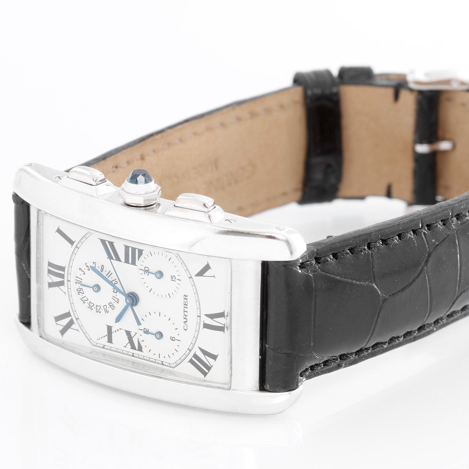Cartier Tank Americaine (or American) Chronograph Men's Watch W2603356 -  Quartz chronograph with date. 18k white gold rectangular style case (26mm x 45mm). Ivory colored dial with black Roman numerals; date; hour minutes and seconds recorders.