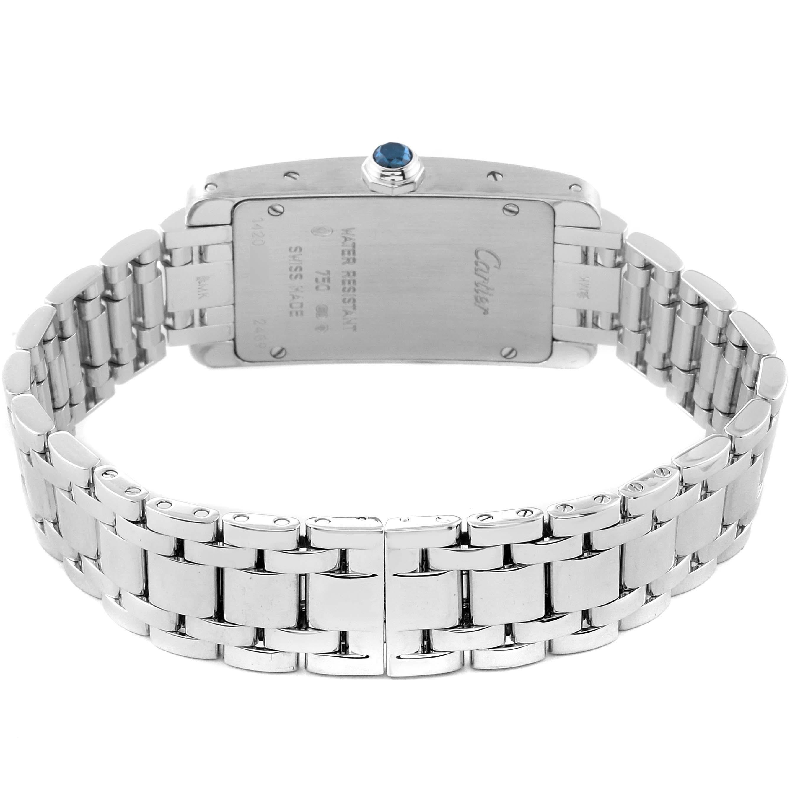 Cartier Tank Americaine Silver Dial White Gold Ladies Watch W26019L1 Box Papers. Quartz movement. 18K white gold case 19.0 x 35.0 mm. Octogonal crown set with faceted blue sapphire. . Scratch resistant sapphire crystal. Silver dial with black Roman