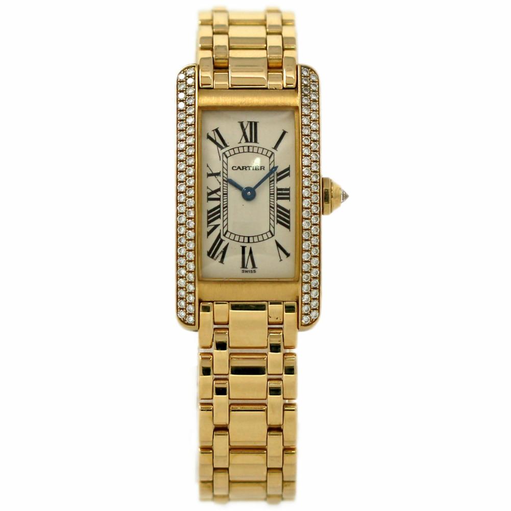 Cartier Tank Americaine  Reference #:WB7043JQ. Cartier Tank Americaine Silver Dial Ladies WB7043JQ. Gold-tone 18kt yellow gold case with a 18kt yellow gold bracelet. Fixed 18kt yellow gold bezel. Silver-tone dial with blue hands and Roman numeral