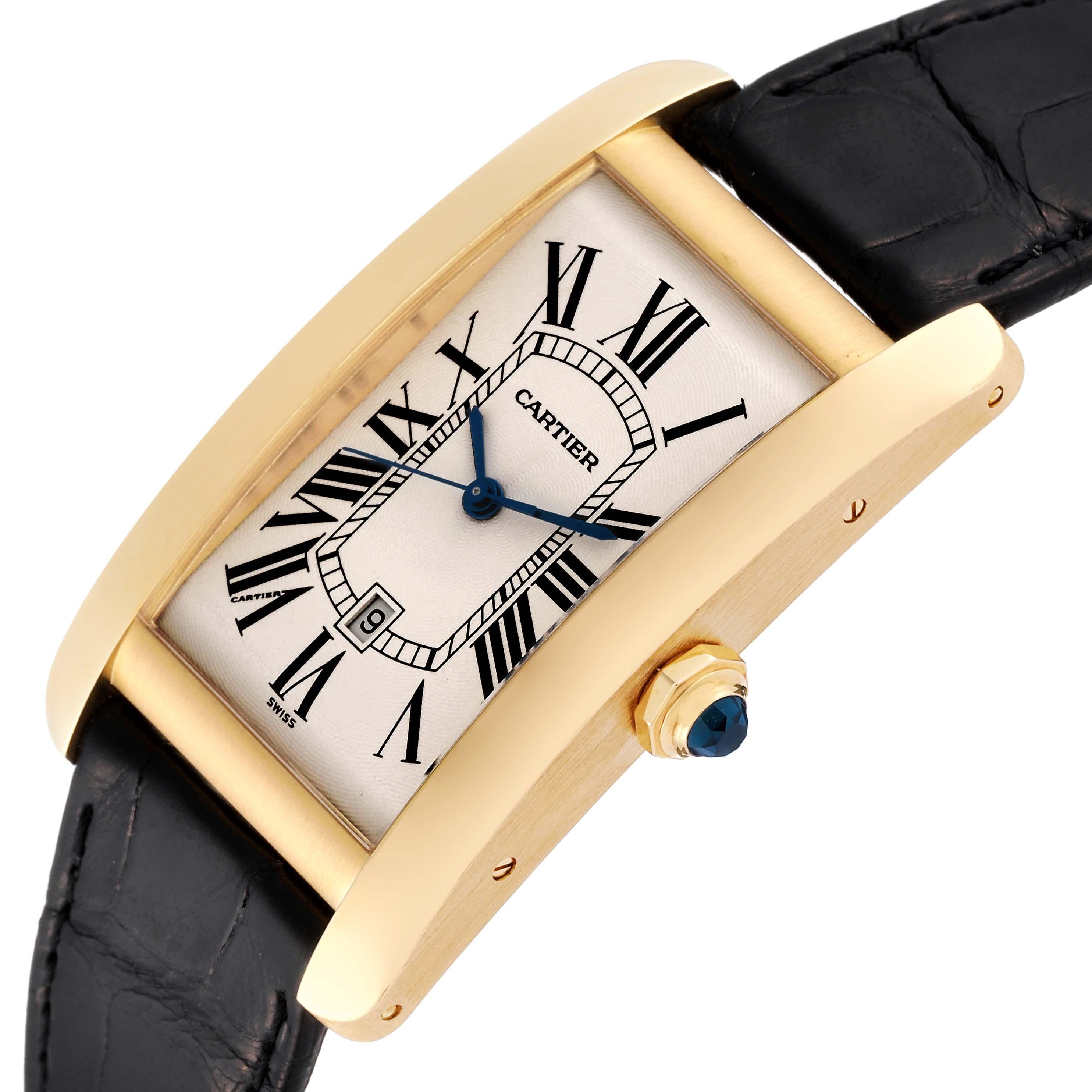 Cartier Tank Americaine Yellow Gold Automatic Mens Watch W2603156 Box Papers. Automatic self-winding movement. 18K yellow gold case 26.6 x 45.1 mm. Octagonal crown set with faceted blue sapphire. . Scratch resistant sapphire crystal. Silvered