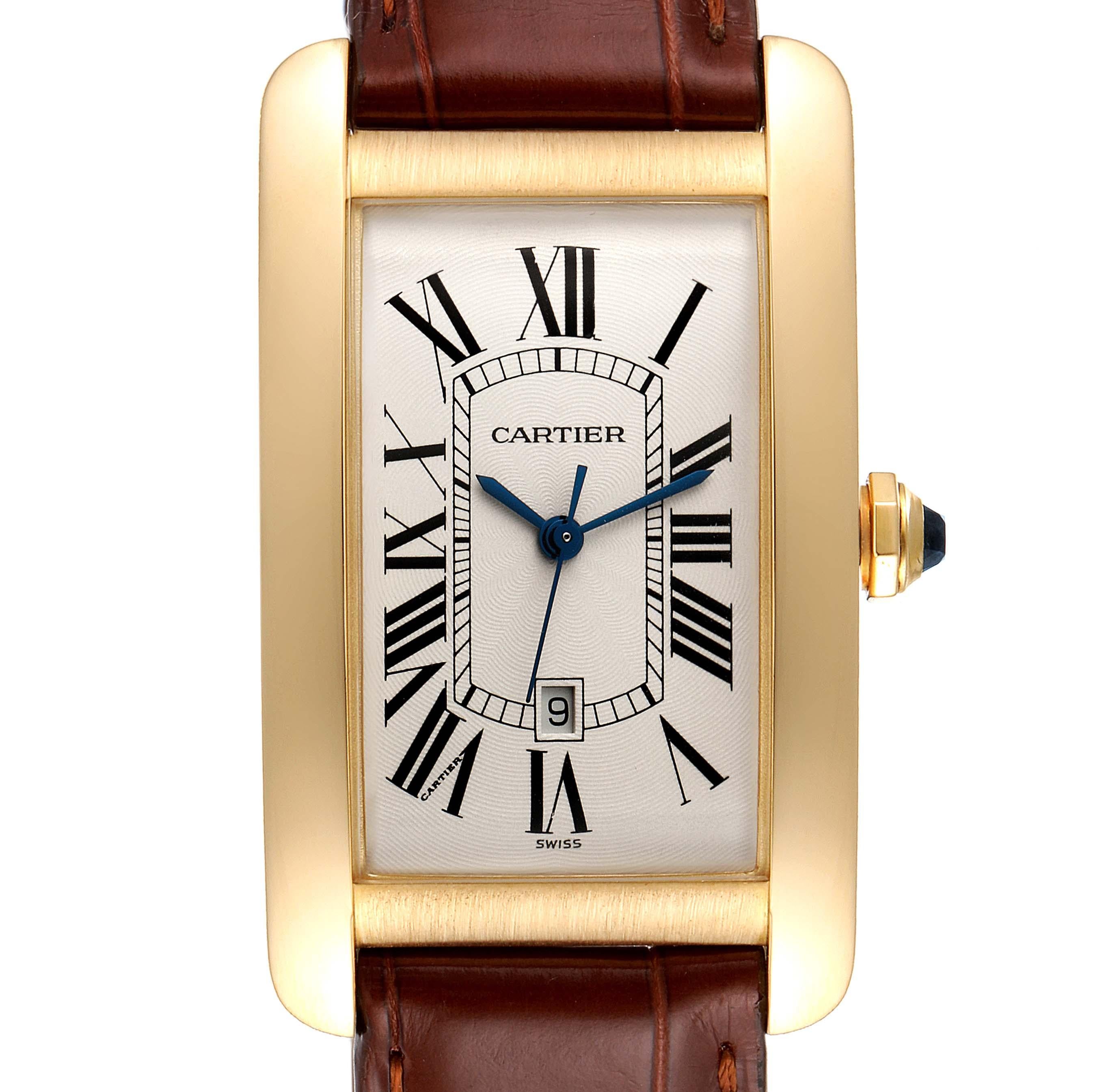 Cartier Tank Americaine Yellow Gold Automatic Mens Watch W2603156. Automatic self-winding movement. 18K yellow gold case 26.6 x 45.1 mm. Circular grained crown set with faceted blue sapphire. . Scratch resistant sapphire crystal. Silvered guiloche