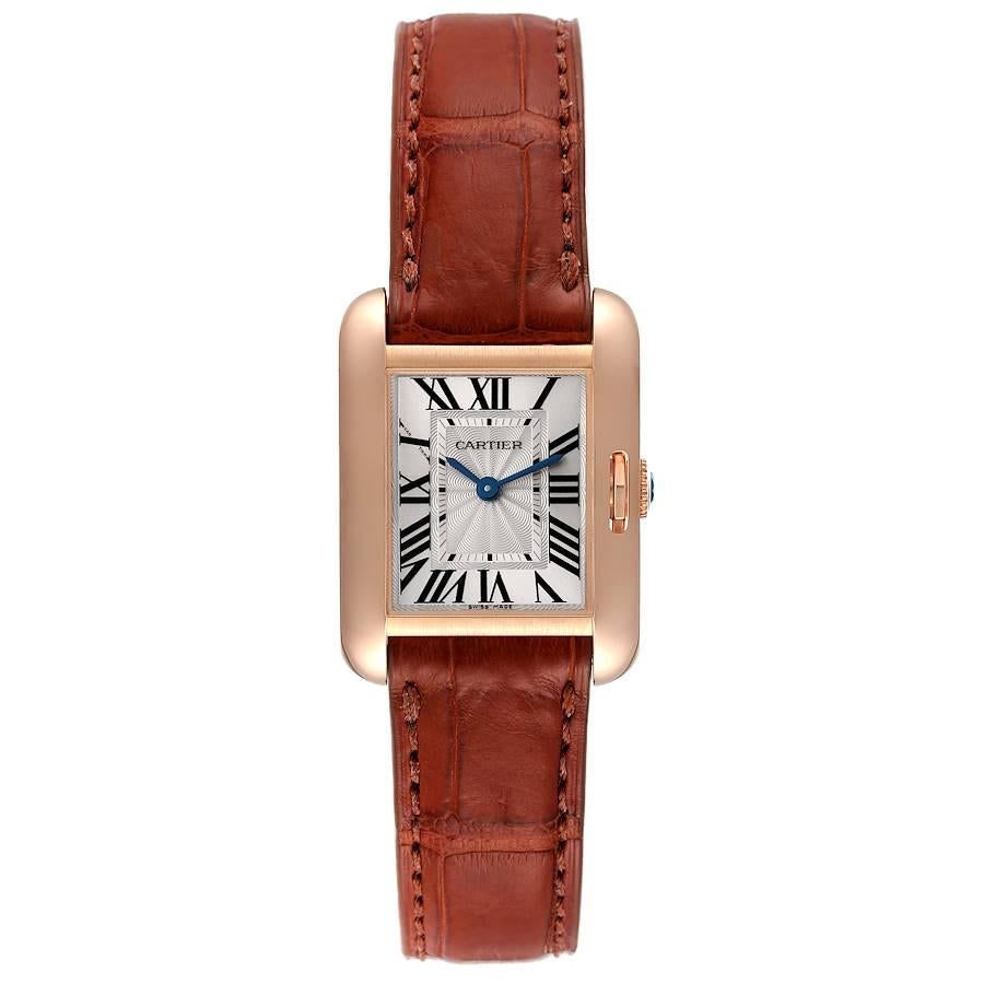 Cartier Tank Anglaise 18K Rose Gold Small Ladies Watch W5310027. Quartz movement. 18K rose gold case 30 x 23 mm. Circular grained crown set with the blue sapphire. . . Flinque silvered dial with roman numerals. Sword shaped blue hands. Secret