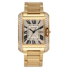 Cartier Montre Tank Anglaise de taille moyenne en or jaune 18 carats et diamants, pour femmes 3509
