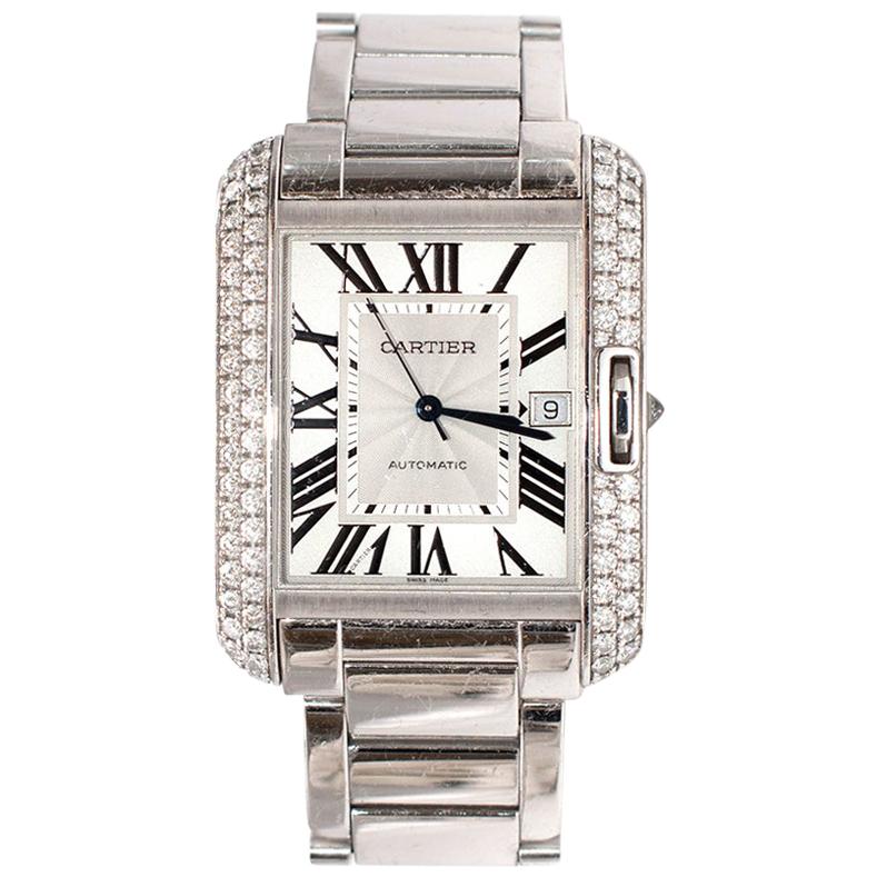 Cartier Tank Anglaise XL 18k White Gold with Diamonds

- Age 2015
- Swiss made
- Roman Numeral Hour Markers 
- Sword blue hands
- Crown Set with Brilliant-cut Diamond
- Brilliant-cut Diamonds Set on Case
- Date Feature at 3 O'Clock
- Self-winding