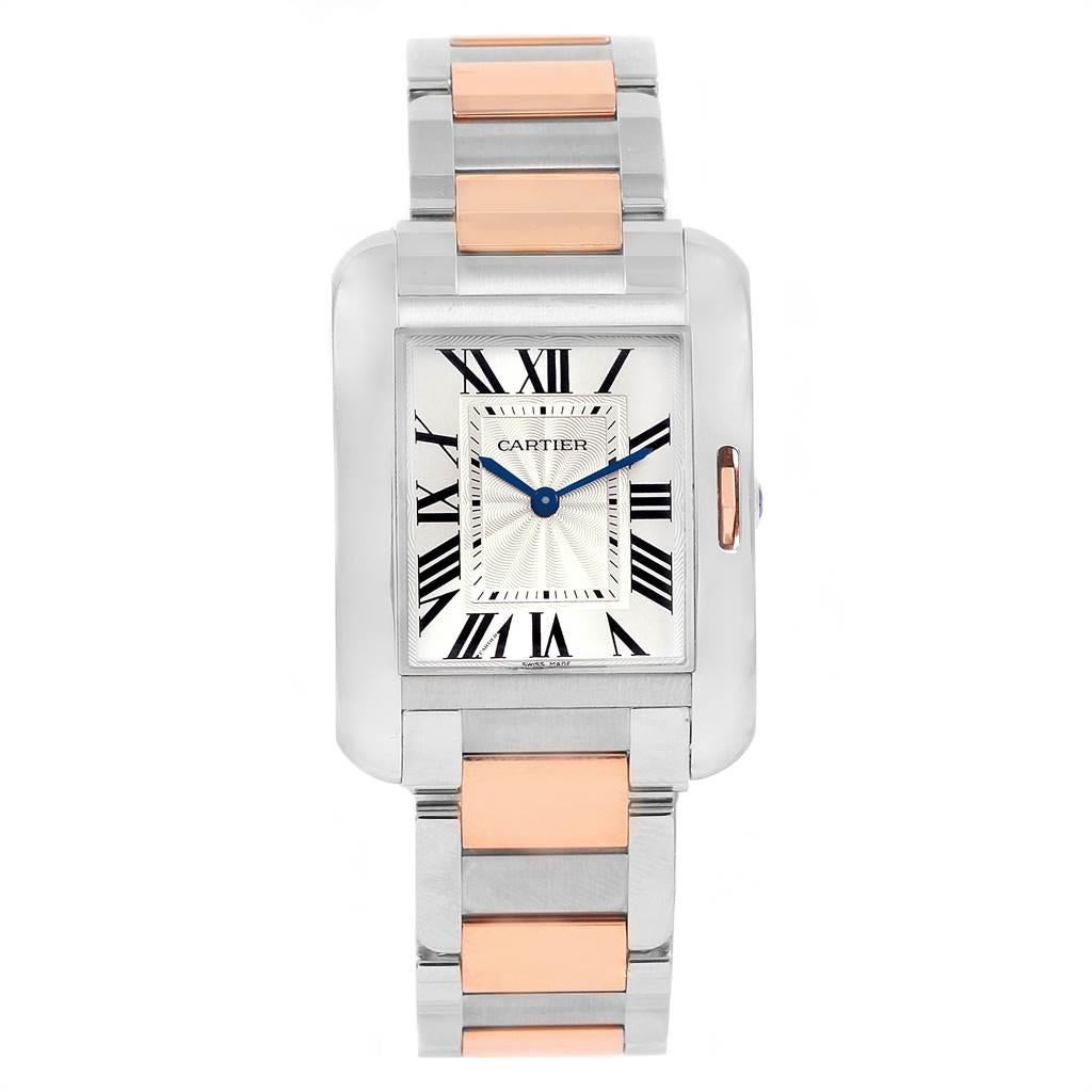 Cartier Tank Anglaise Medium Steel Rose Gold Watch WT100032. Quartz movement. Stainless steel and 18K rose gold case 34.7 x 26.2 mm. Circular grained crown set with the blue spinel. Scratch resistant sapphire crystal. Flinque and silvered dial with