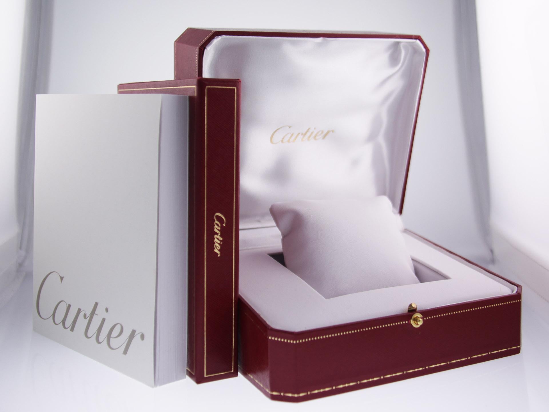 Brand:	Cartier	
Movement:	Automatic, Cartier Calibre 076
Series:	Tank Anglaise	
Functions:	Hour, Minute
Model #:	WT100025	
Gender:	Ladies'	
Condition:	Excellent Display Model, Faint Scratches on Bezel, Case & Bracelet	
Dial Markers:	Silver Dial w/