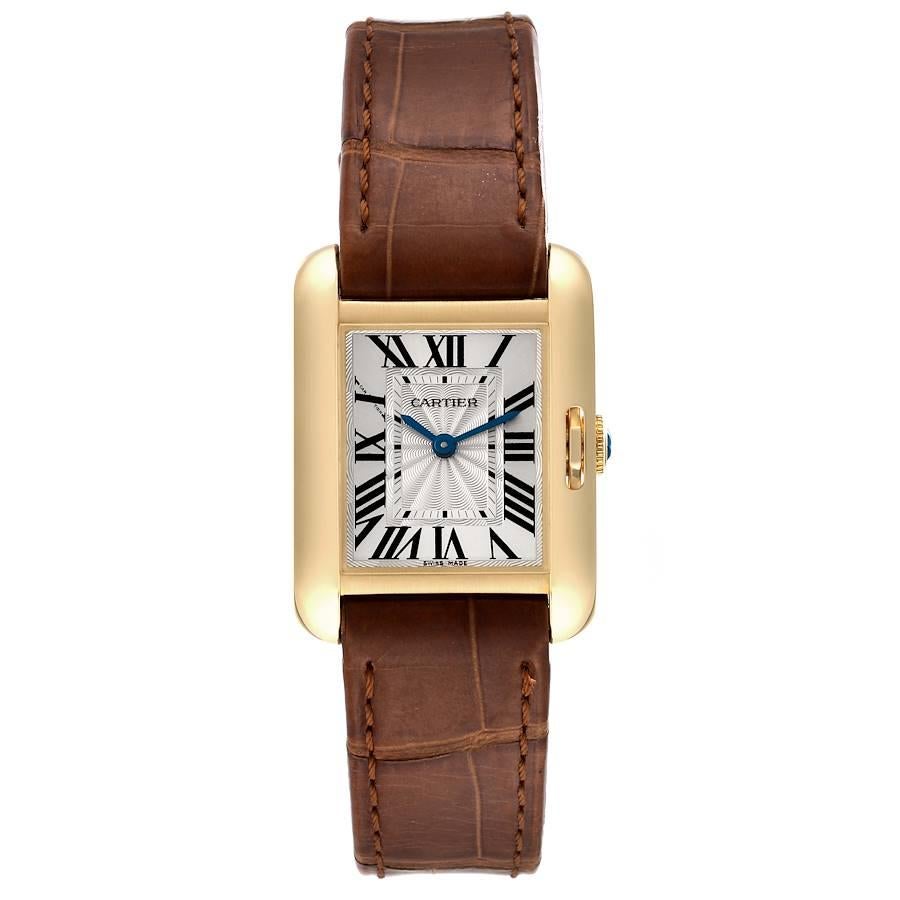 Cartier Tank Anglaise Yellow Gold Silver Dial Ladies Watch W5310028. Quartz movement. 18K yellow gold case 30.2 x 22.7 mm. Circular grained crown set with the blue cabochon. . Scratch resistant sapphire crystal. Flinque and silvered dial with black