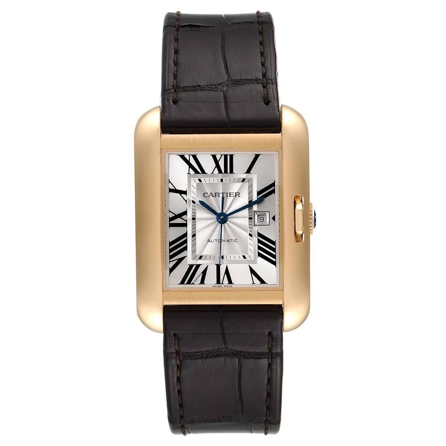 Cartier Tank Anglaise Yellow Gold Silver Dial Mens Watch W5310030. Automatic self-winding movement. 18K yellow gold case 39 x 30 mm. Circular grained crown set with the blue sapphire. . Scratch resistant sapphire crystal. Silver guilloche dial with