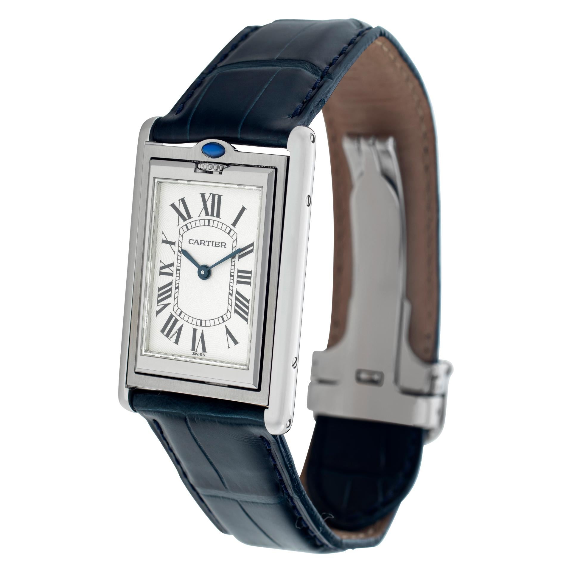 Cartier Tank Basculante in stainless steel on leather strap with Cartier deployant buckle. Manual. 31 mm x 25.5 mm case size. With box and papers. Ref 2390 / w1011358. Fine Pre-owned Cartier Watch. Certified preowned Classic Cartier Tank Basculante