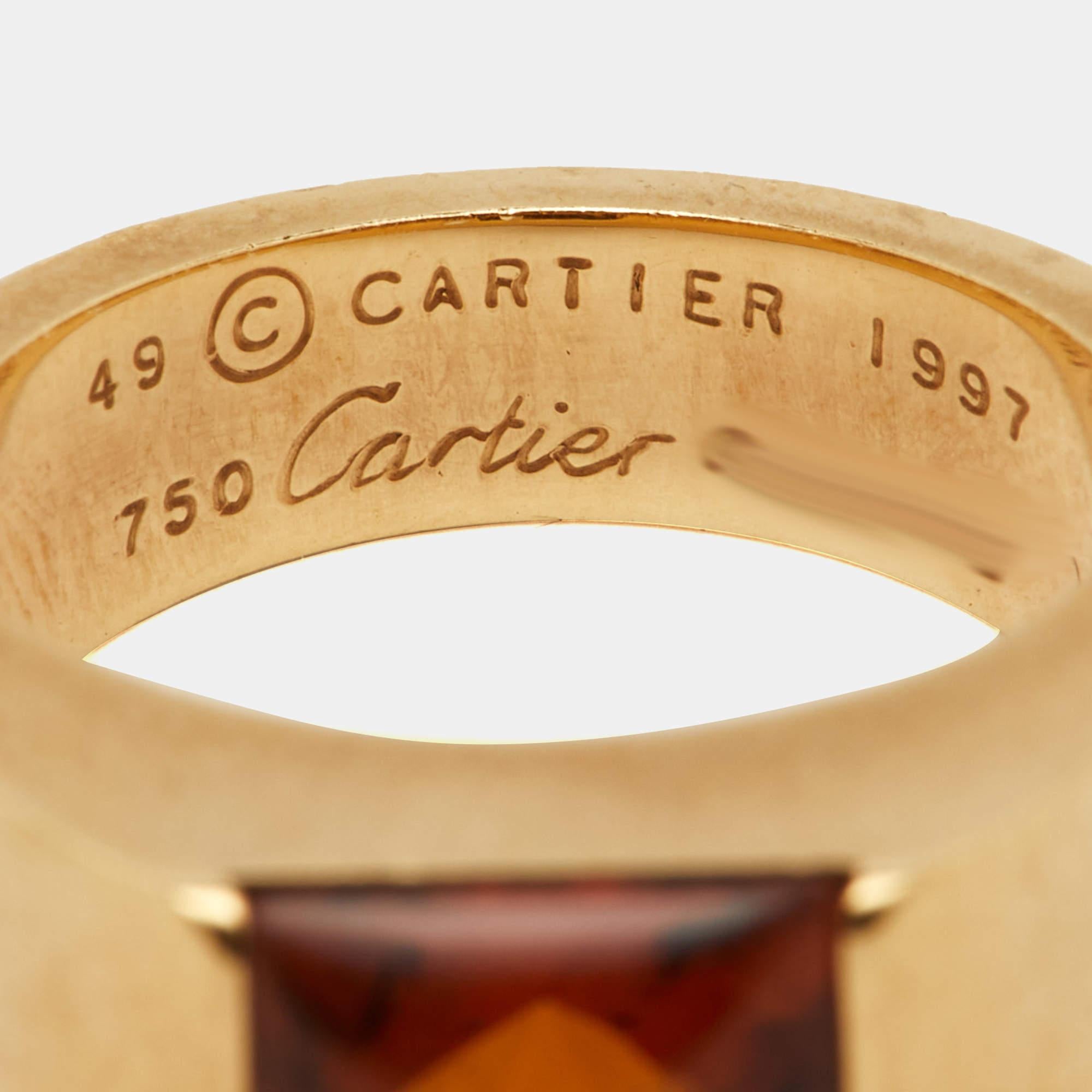 The Cartier Tank Citrine ring is an exquisite jewelry piece. Crafted from luxurious 18k yellow gold, it features a rectangular citrine gemstone with a timeless and elegant tank-inspired design. This ring effortlessly combines classic aesthetics with