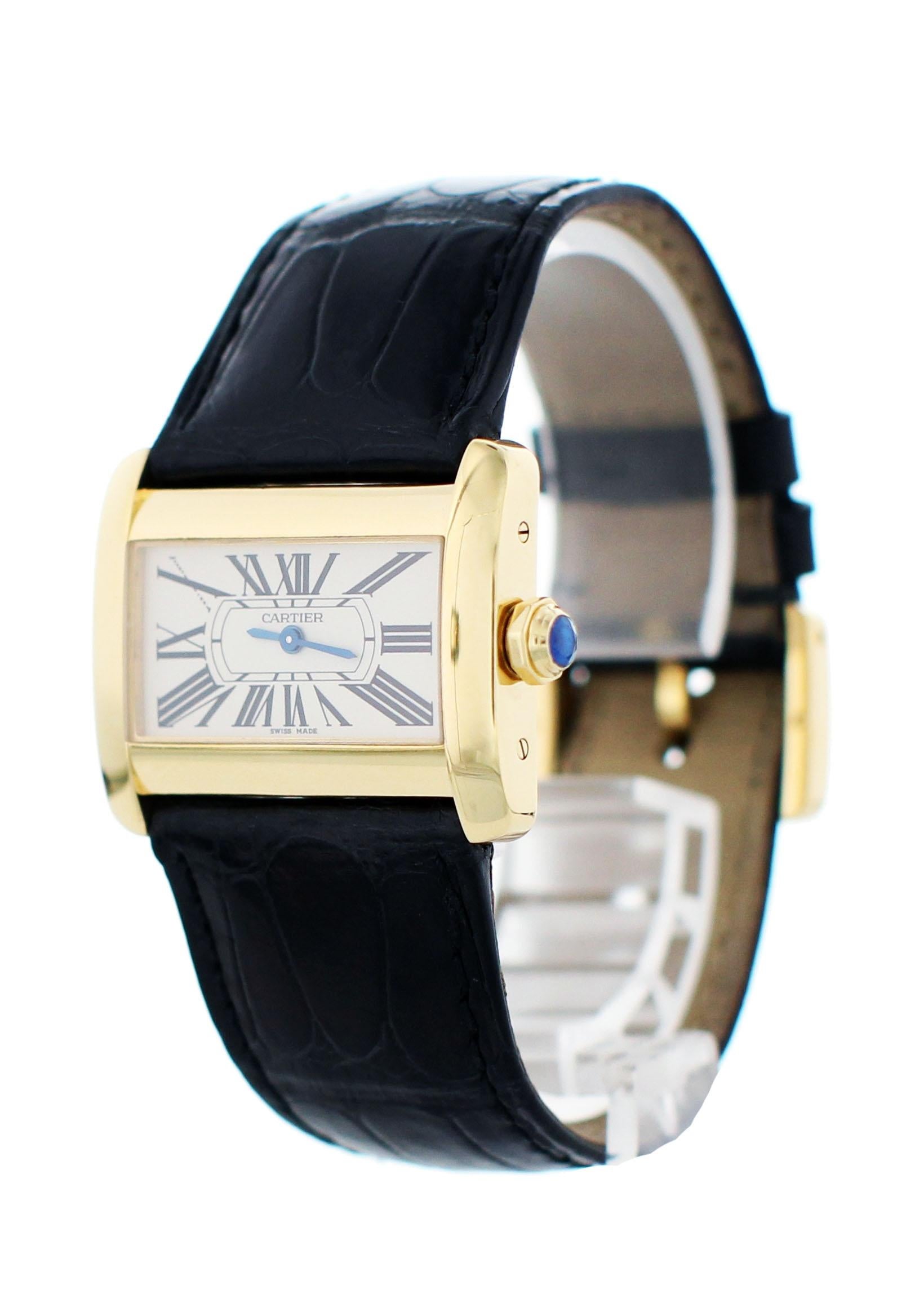 Cartier Tank Divan 18K Yellow Gold 2601 Ladies Watch. 31 x 25 mm 18k yellow gold case. White dial with blue steel hands and black Roman numerals hour markers.  Adjustable black alligator leather band with an 18k yellow gold buckle. Automatic