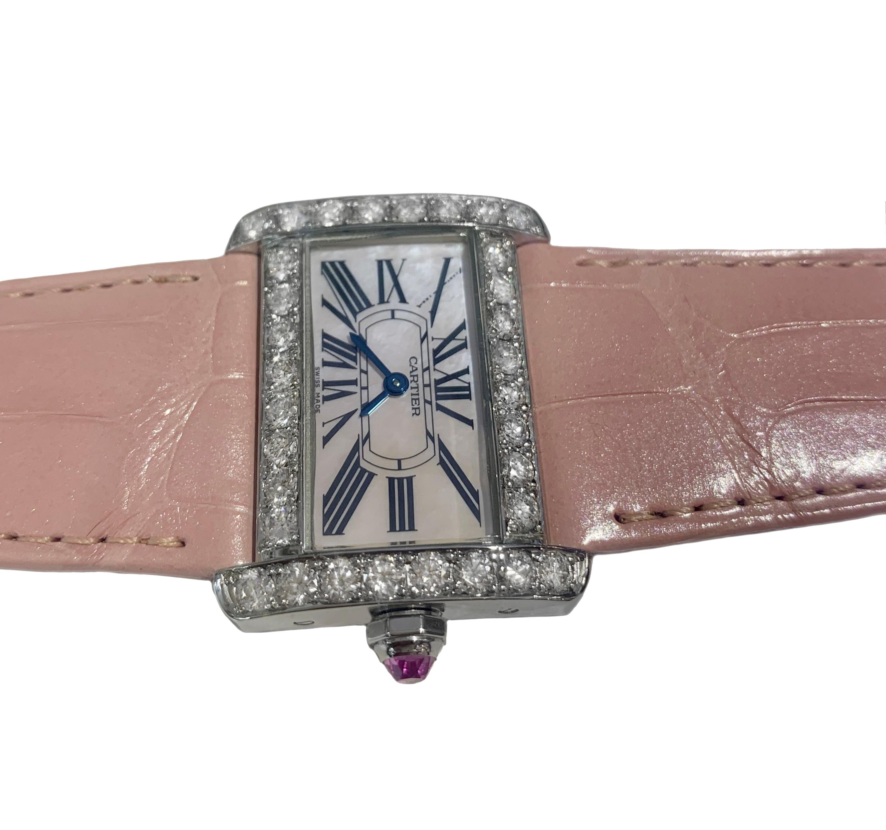 -Mint condition
-Case size: 25x31mm
-Stainless steel
-Movement: Quartz
-Roman numeral hour markers
-Pink leather strap
-Aftermarket Diamond Bezel: 2.6ct, E-F color, VS1 clarity
-Comes with Box, no papers