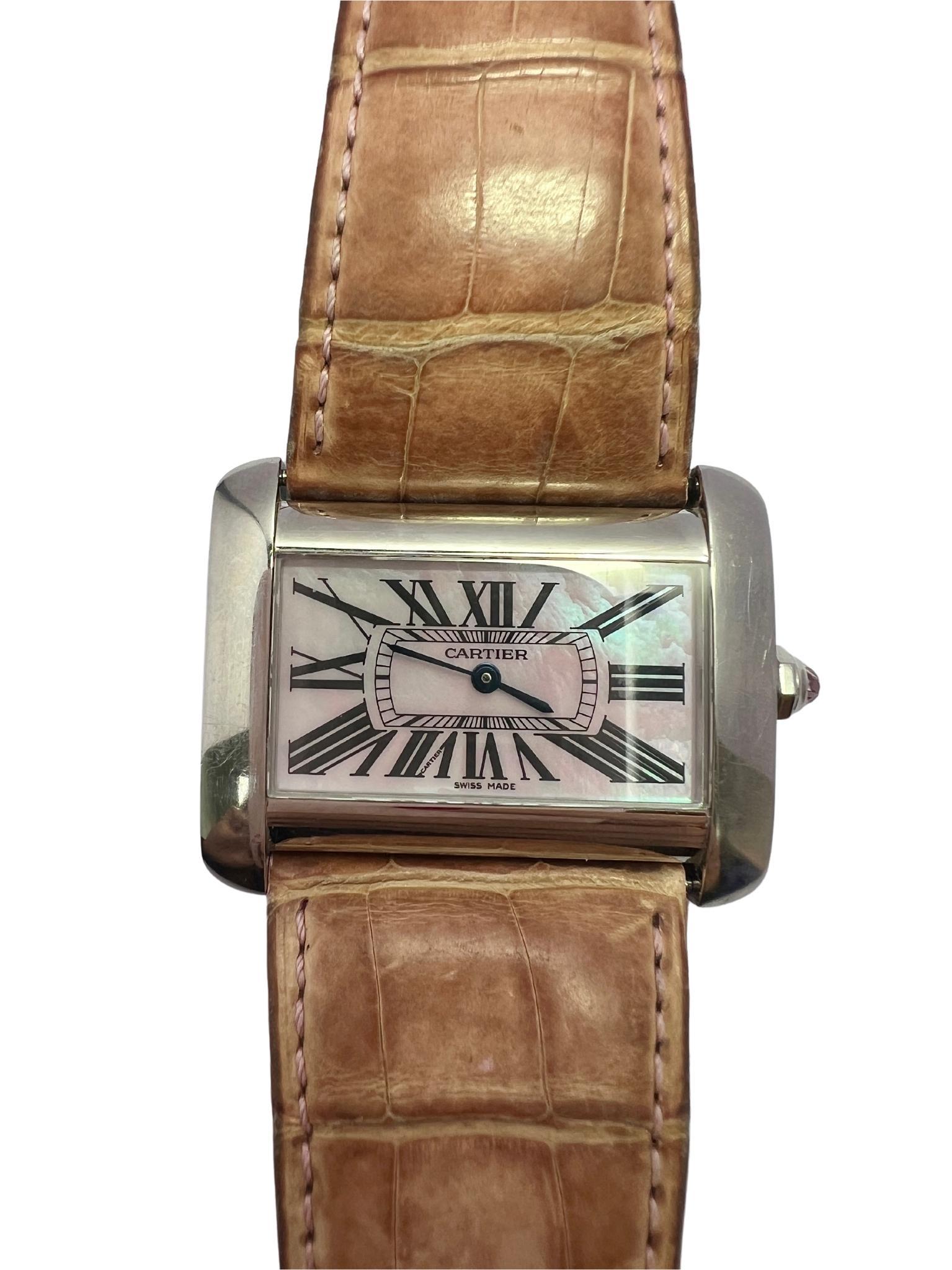 Cartier Tank Divan Pink Mother of Pearl Dial Quartz Lady Watch

Measurements: 24mm long x 38.38mm wide, 
Movement: Quartz
Dial: Pink Rose dial
Case: Stainless steel
Diameter: 32mm 
Strap: leather 
Watertightness: Water Resistant 
Hallmarked: