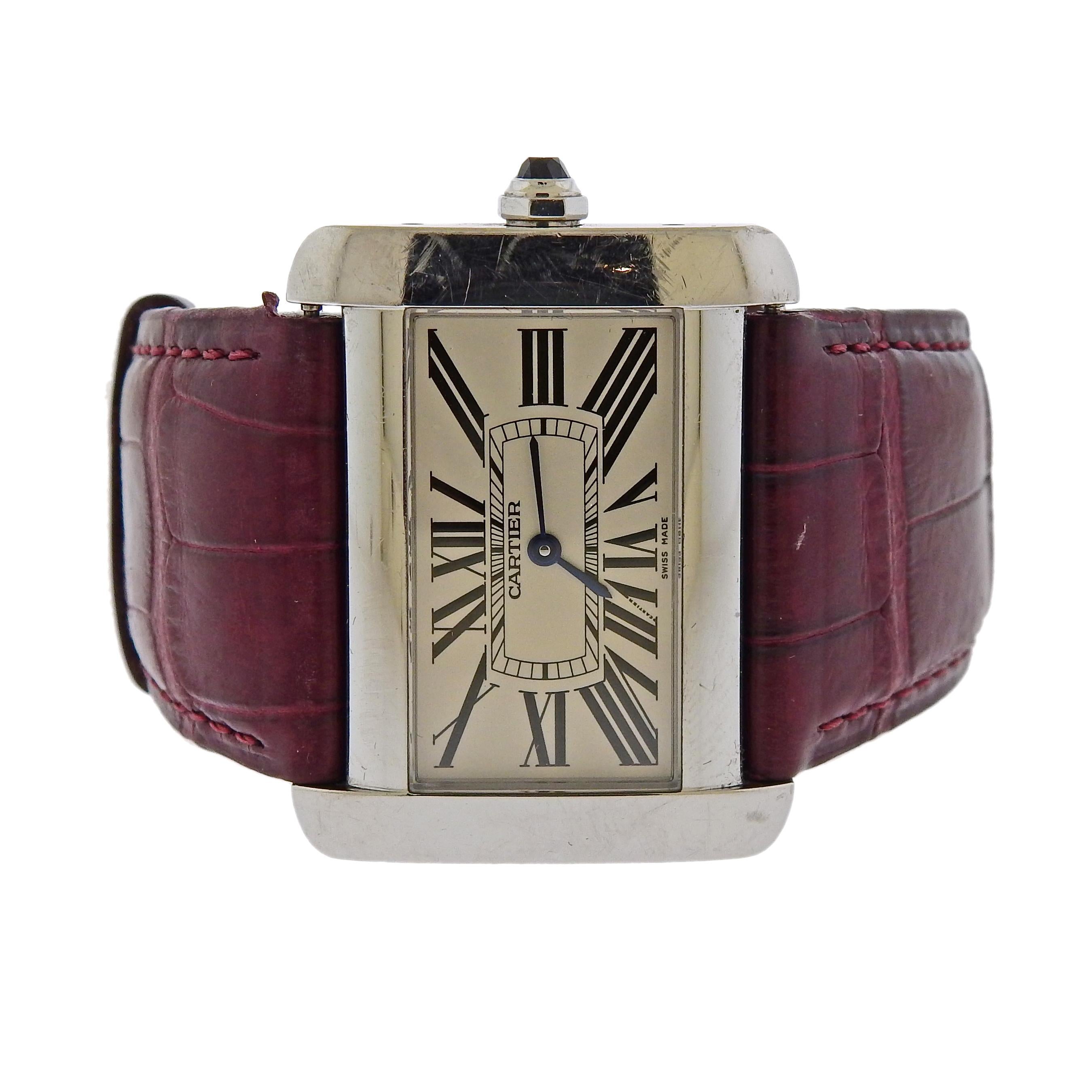 Cartier Tank Divan Stainless Steel unisex wristwatch. White dial, Roman numeral hour markers, a Cartier purple leather strap, sapphire crystal glass and automatic movement. 

SKU#W-00605


