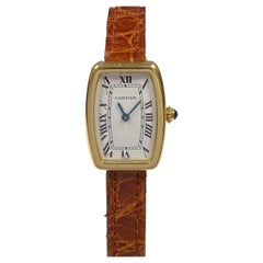 Cartier Montre-bracelet mécanique vintage Tank Fabergé Tonneau en or jaune pour femmes