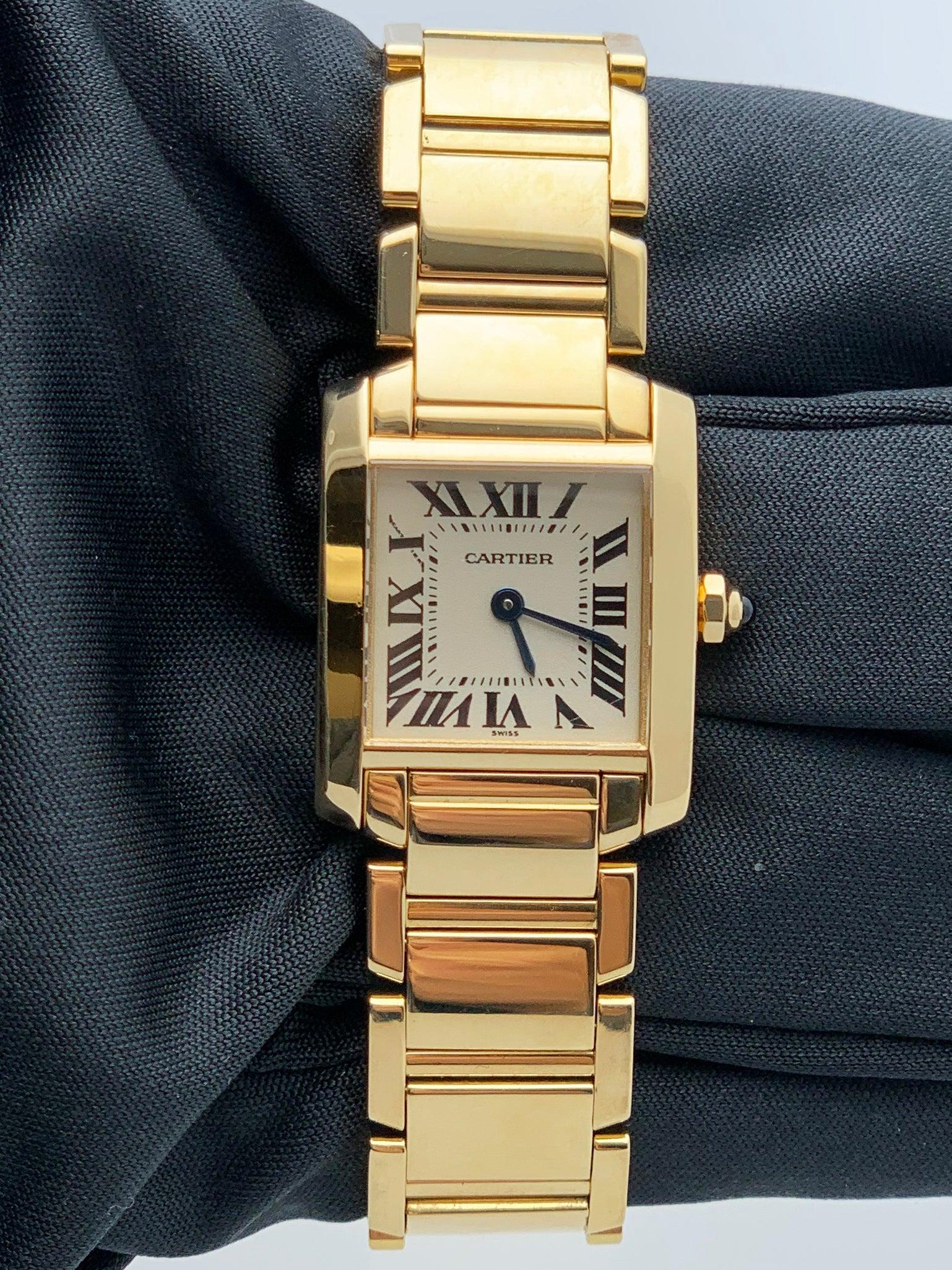Cartier Tank Francaise 1820 Ladies Watch. 20mm 18k Yellow Gold case with 18K Yellow Gold smooth bezel. Off-White dial with Blue steel hands and Roman numeral hour markers. Minute markers on the inner dial. 18K Yellow Gold Bracelet with Hidden