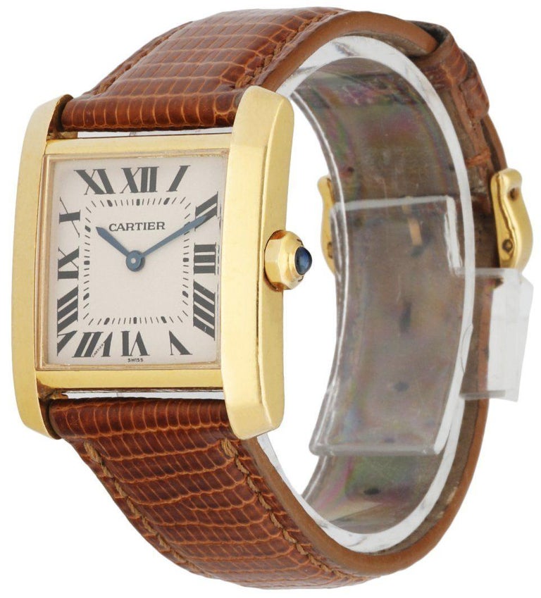 
Cartier Tank Francaise WGTA0031 Ladies Watch. 25mm 18k Yellow gold case. Yellow Gold bezel. Off-White dial with blue steel hands and Roman numeral hour markers. Minute markers on the inner dial. Leather lizard strap with Tang-buckle. Will fit up to