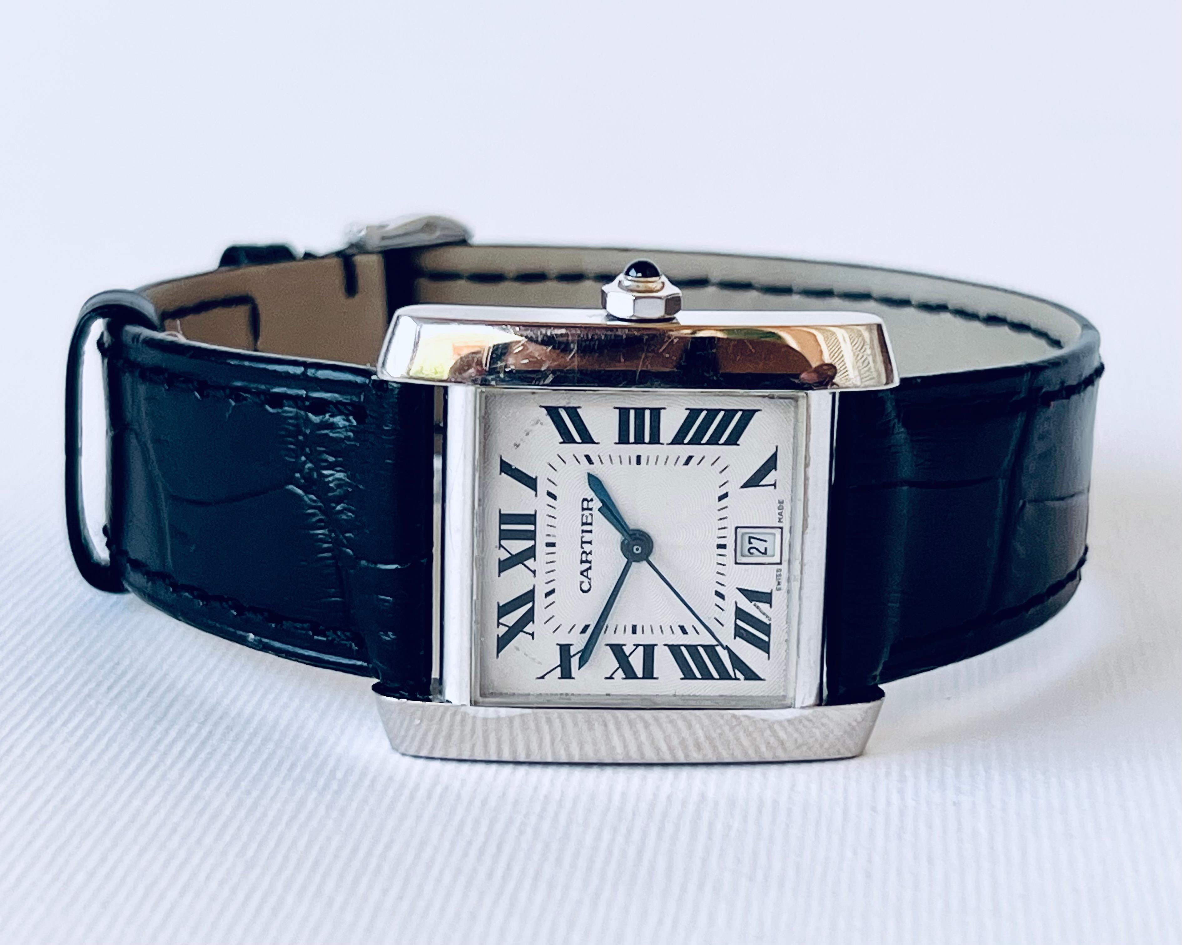 Cartier Tank Française 18K White Gold 2366 Automatic Date Watch Boxed

Brand: Cartier  
 
Model : Cartier Tank Française  
 
Reference Number :  2366  

Watch Number:  892593 CD

Features : Crystal Sapphire -  Roman numerals Dial - Water