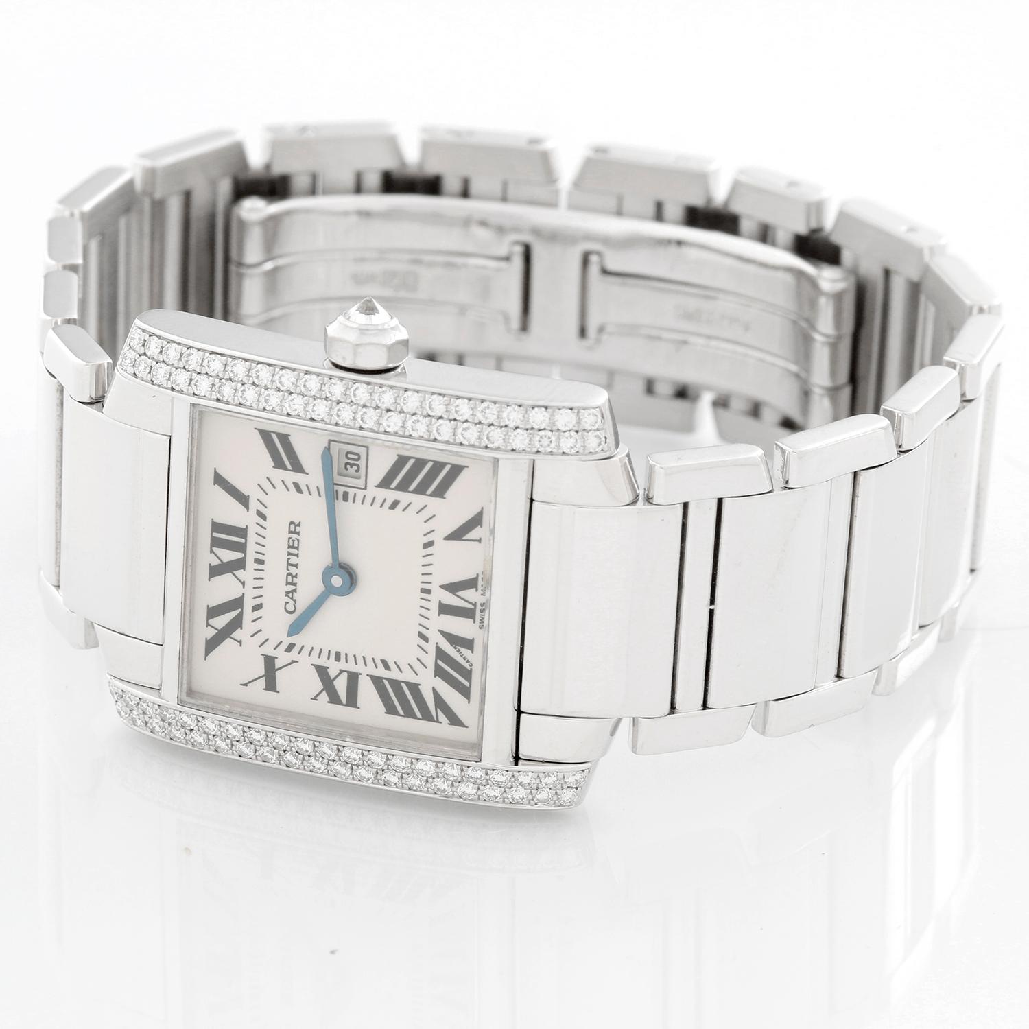 Cartier Tank Francaise 18k White Gold Midsize Diamond Watch WE101851 - Quartz. 18k white gold  case with 2 rows of factory diamonds on either side  (25mm x 30mm). White dial with black Roman numerals; date at 3 o'clock. 18k White gold Cartier