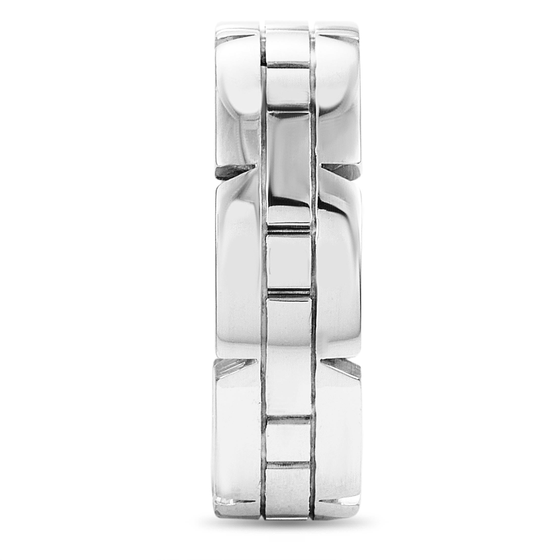 The Cartier “Tank Française” ring is made of 18K white gold and weighs 9.5 grams. The ring boasts band thickness of 6 mm and top height of 1.5 mm, while top dimensions measure 21 by 6 mm.

This item is offered in estate condition and includes the