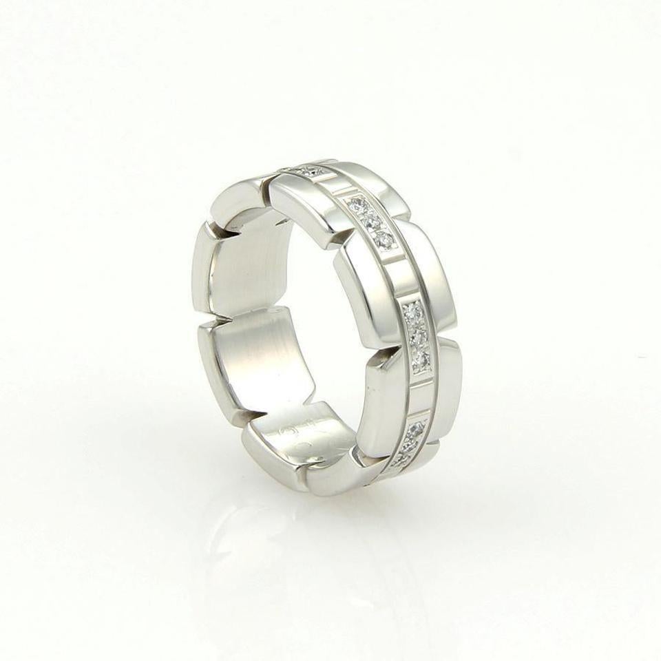 (28592)

Cartier Tank Franchaise Diamonds 18k White Gold Band Ring Size EU 58.

This is an authentic band ring by Cartier from the TANK collection, it is crafted from solid 18k white gold in a high polished finish, around the center of the band are