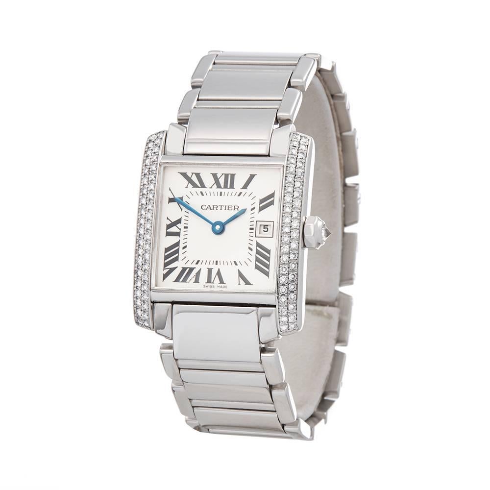 Xupes Ref: W4671
Manufacturer: Cartier
Model: Tank Francaise
Model Ref: 2491 or WE1018S3
Age: 01/01/2000 00:00:00
Gender: Women's
Box and Papers: Box, Manuals & Guarantee
Dial: White Roman
Glass: Sapphire Crystal
Movement: Quartz
Water Resistance: