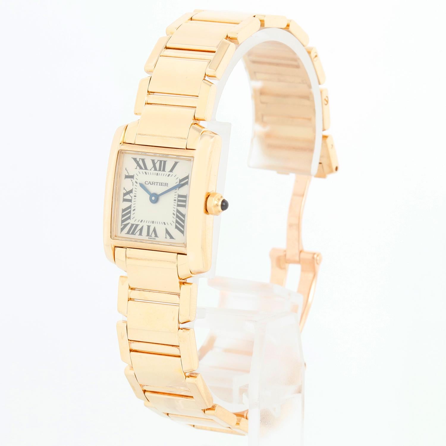 Cartier Tank Francaise 18k Yellow Gold Ladies Watch 1820 W50002N2 - Quartz. 18k yellow gold  case (20mm x 25mm). Ivory colored dial with black Roman numerals. 18k yellow gold Cartier Tank Francaise bracelet. Pre-owned with custom box.
