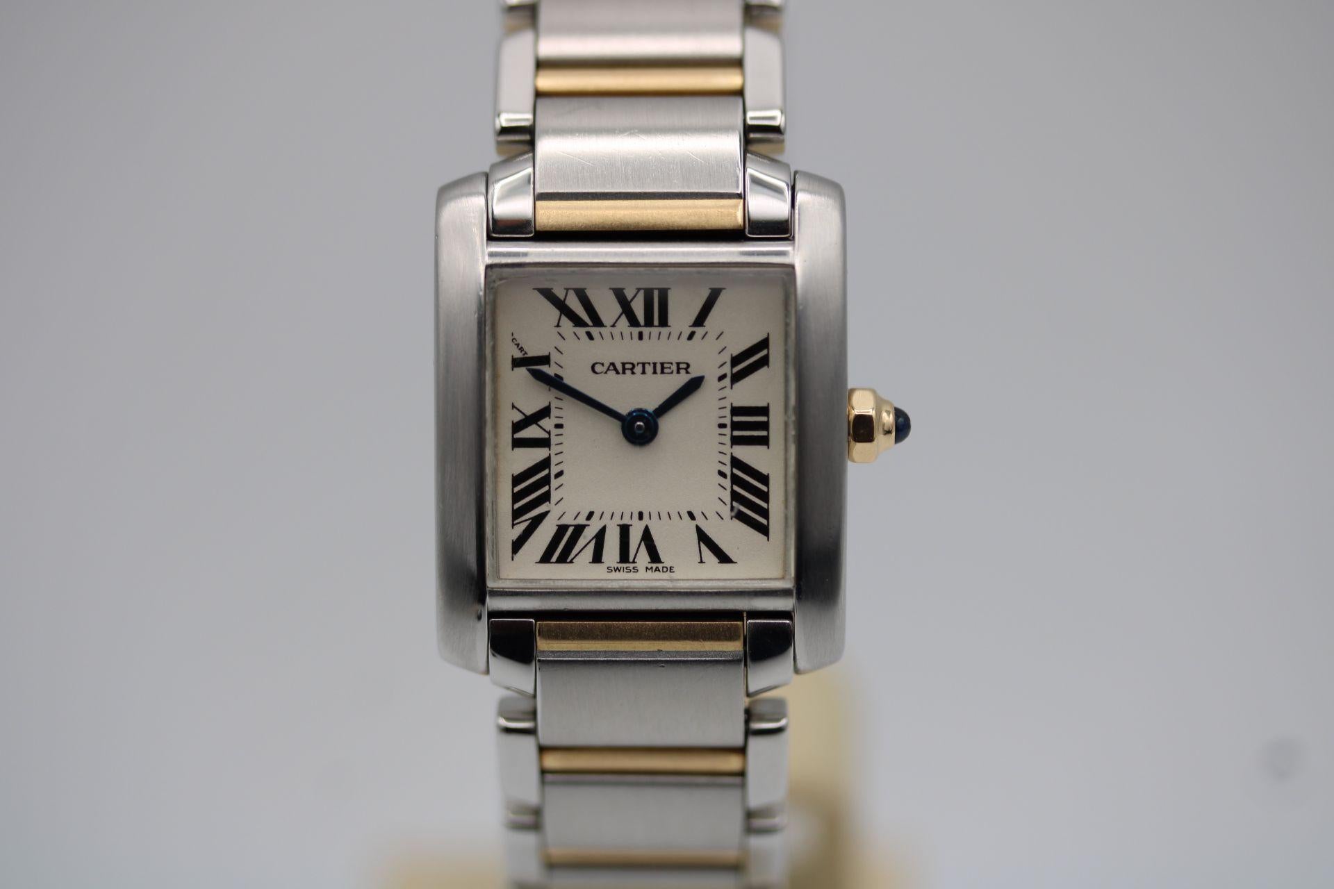 
This elegant Cartier Tank Francaise in stainless steel and gold has just had a gentle polish and a thorough check up in our workshop and is presented in excellent condition as well as working order. Accompanied by its original box and our 12-month