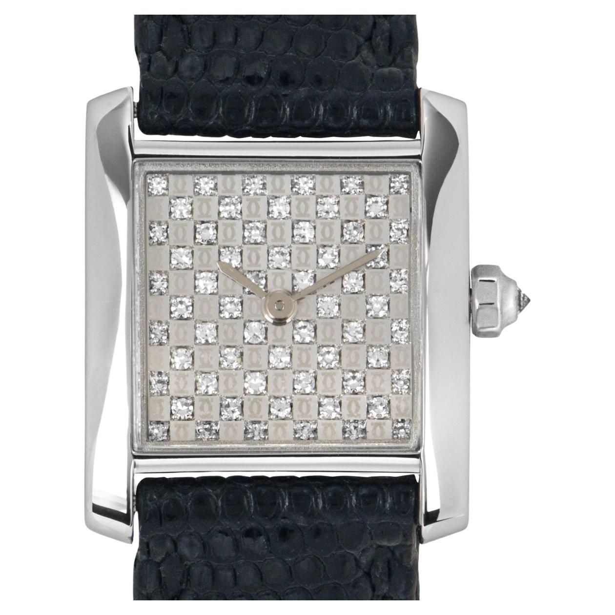 A ladies 20mm Cartier Tank Francaise crafted in white gold. Featuring a striking silver diamond dial with a fixed white gold bezel and crown set with a single inverted diamond. Fitted with a sapphire glass, a quartz movement and a Cartier black