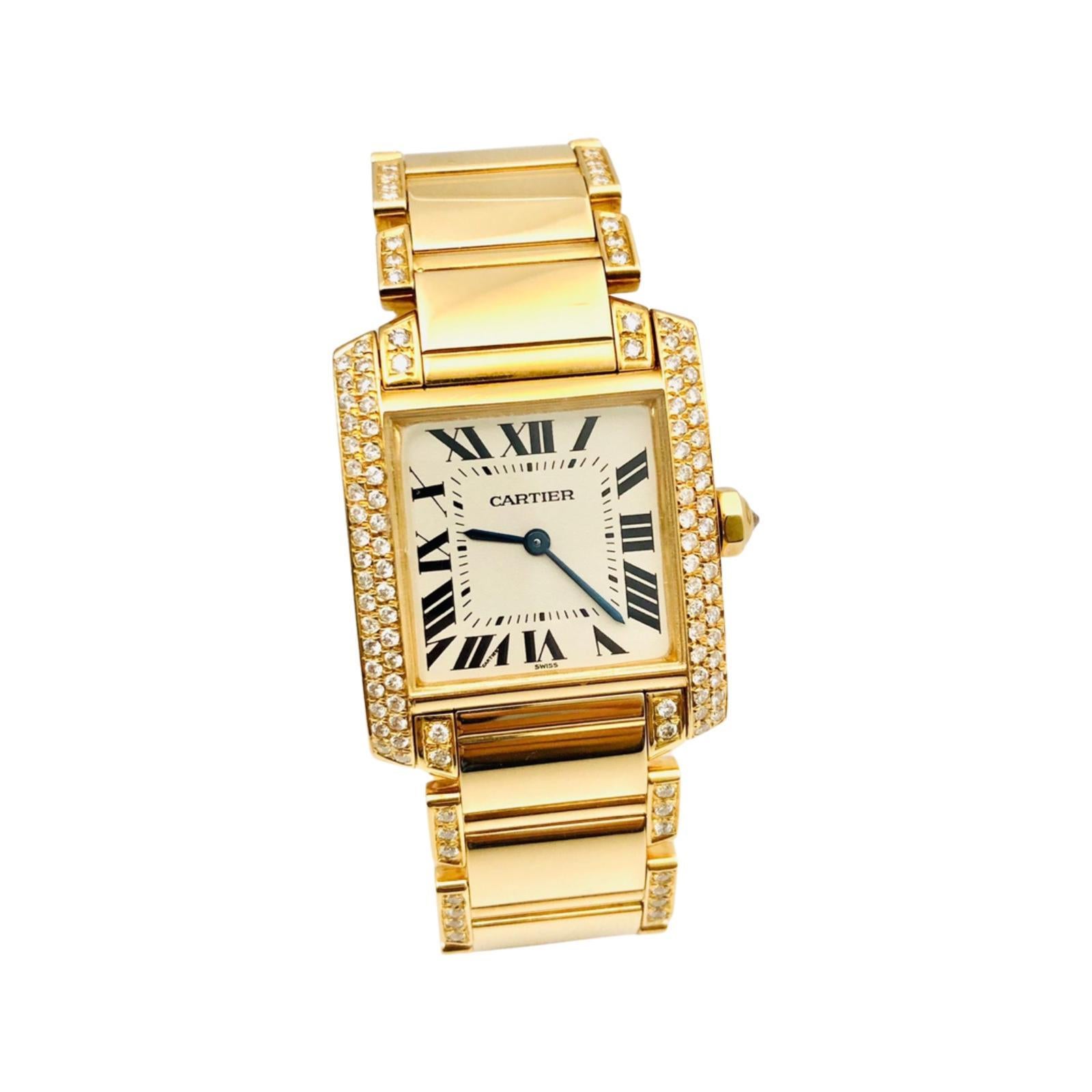 Cartier Tank Francaise ladies' dress watch, featuring a Swiss-made quartz movement; silver grained dial with sword-shaped, blued steel hands; and 29.5 x 25mm, 18k yellow gold case lined with round-cut diamonds on an 18k yellow gold bracelet lined